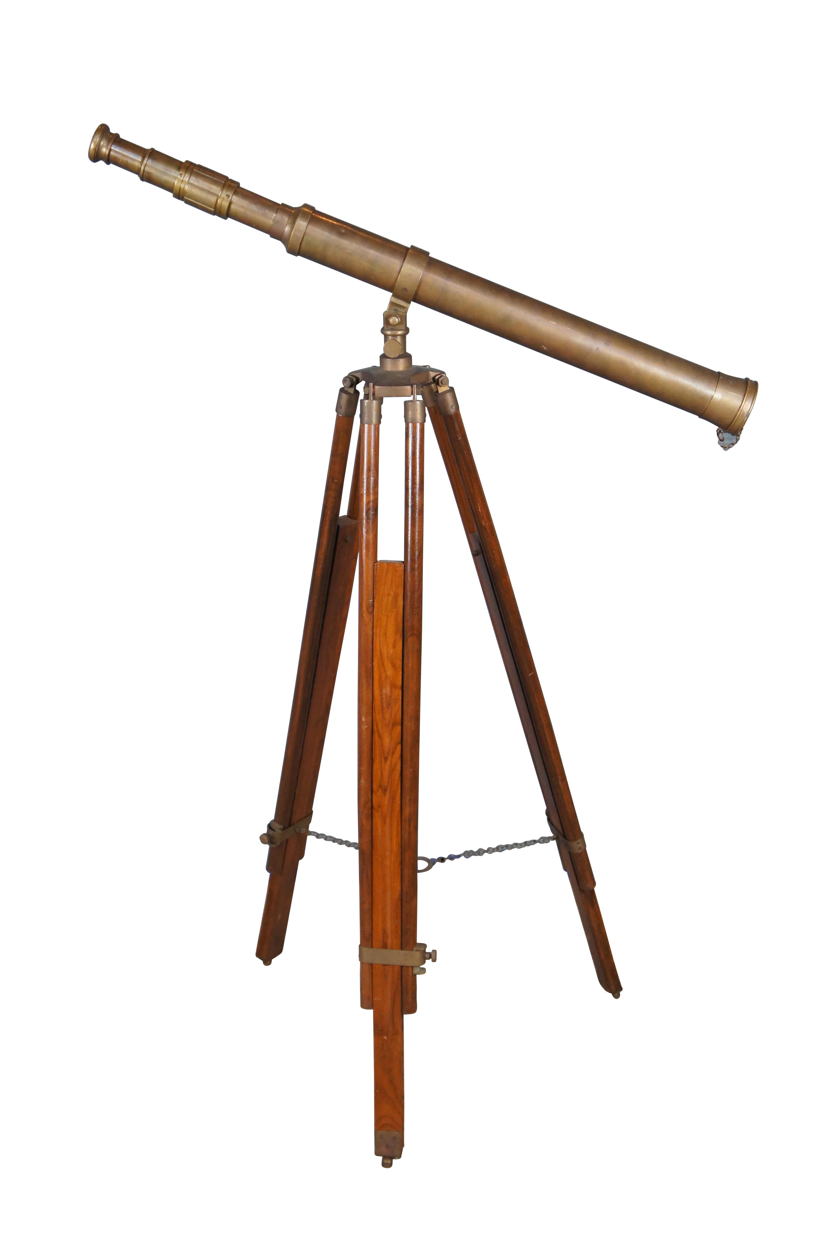 Traditional form English Brass Telescope by Thos. Evans Esq. of London, England. The telescope is mounted to an adjustable wooden tripod base. Circa 20th Century. This item does not have an orbital site system it would be used more for terrestrial