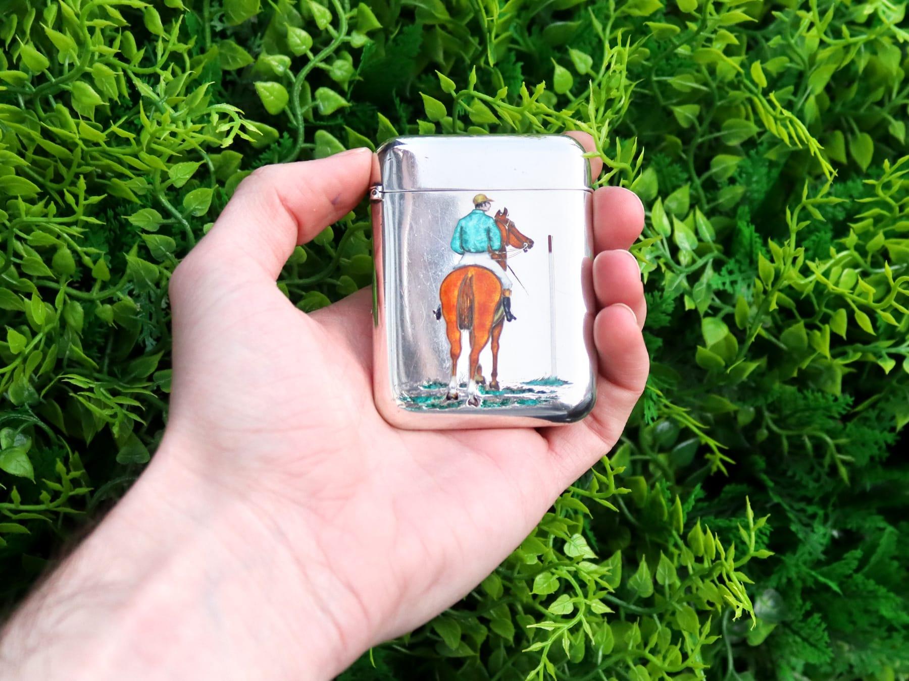 An exceptional, fine and impressive antique Victorian English sterling silver and enamel card case; an addition to our range of silver boxes and cases.

This exceptional antique Victorian sterling silver card case has a rectangular form with