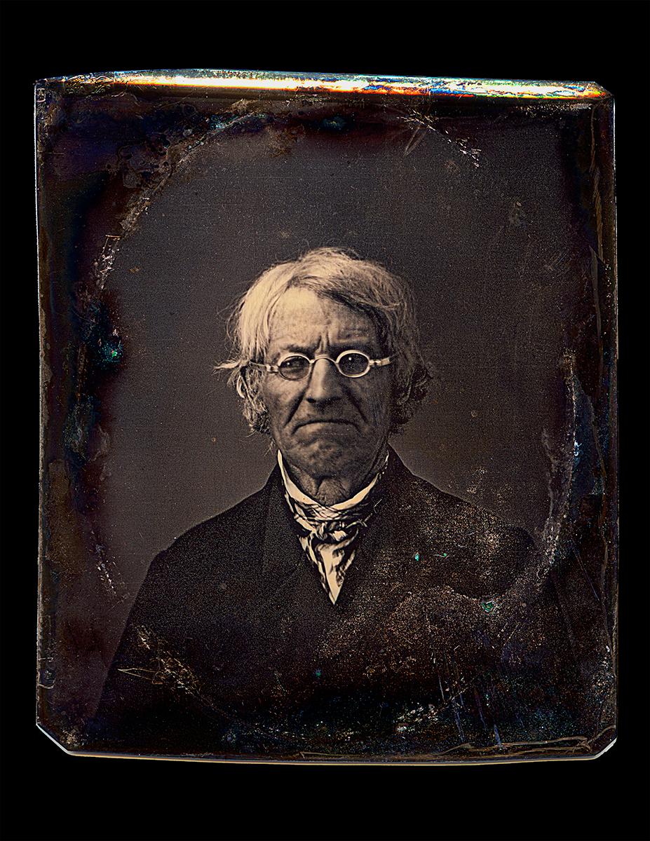 *Listing includes framed archival pigment print and daguerreotype

Man with Spectacles by Thomas Kennaugh is an enlarged and enhanced print of a daguerreotype made in 1850. The original daguerreotype measures approximately 3.5 x 3 inches, and is