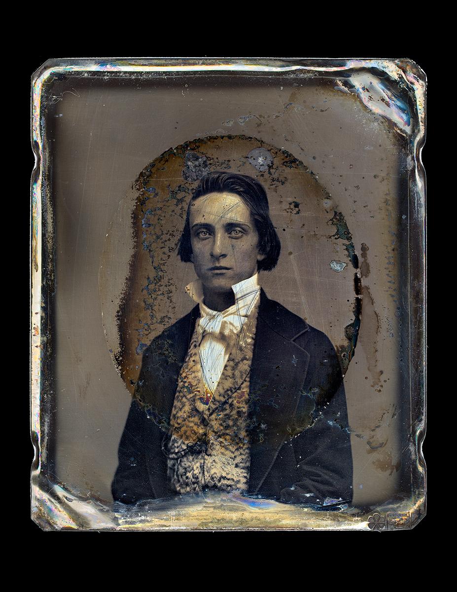 *Listing includes framed archival pigment print AND original daguerreotype

Young Man in a Paisley Vest by Thomas Kennaugh is an enlarged and enhanced print of a daguerreotype made in 1850. The original daguerreotype measures approximately 3.5 x 3