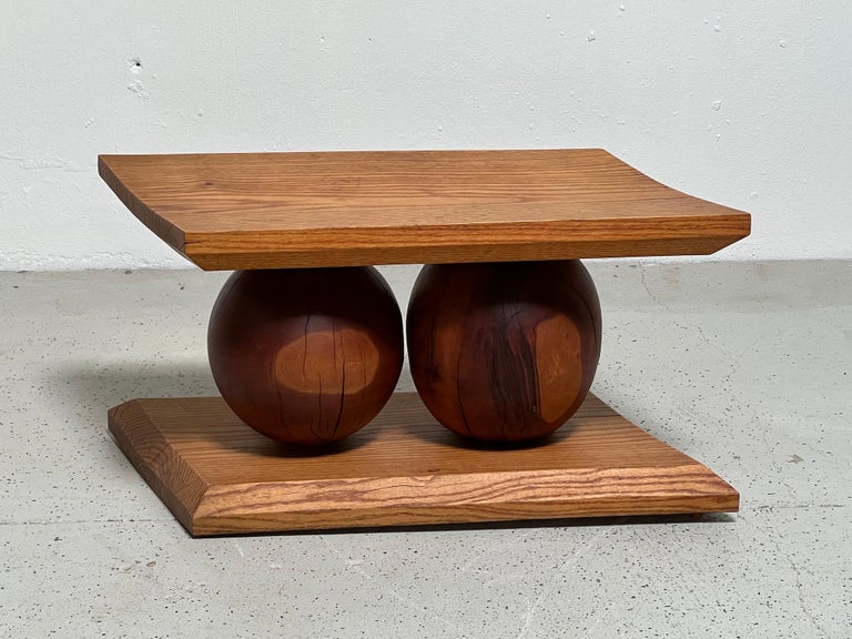 An oak and cherry studio craft bench made by Thomas Lacagnina, 1974. 

Tom Lacagnina received his BFA in 1970 and MFA in 1974 from the Rochester Institute of Technology. From 1969-1970 he worked as a studio assistant to Wendell Castle. He was the