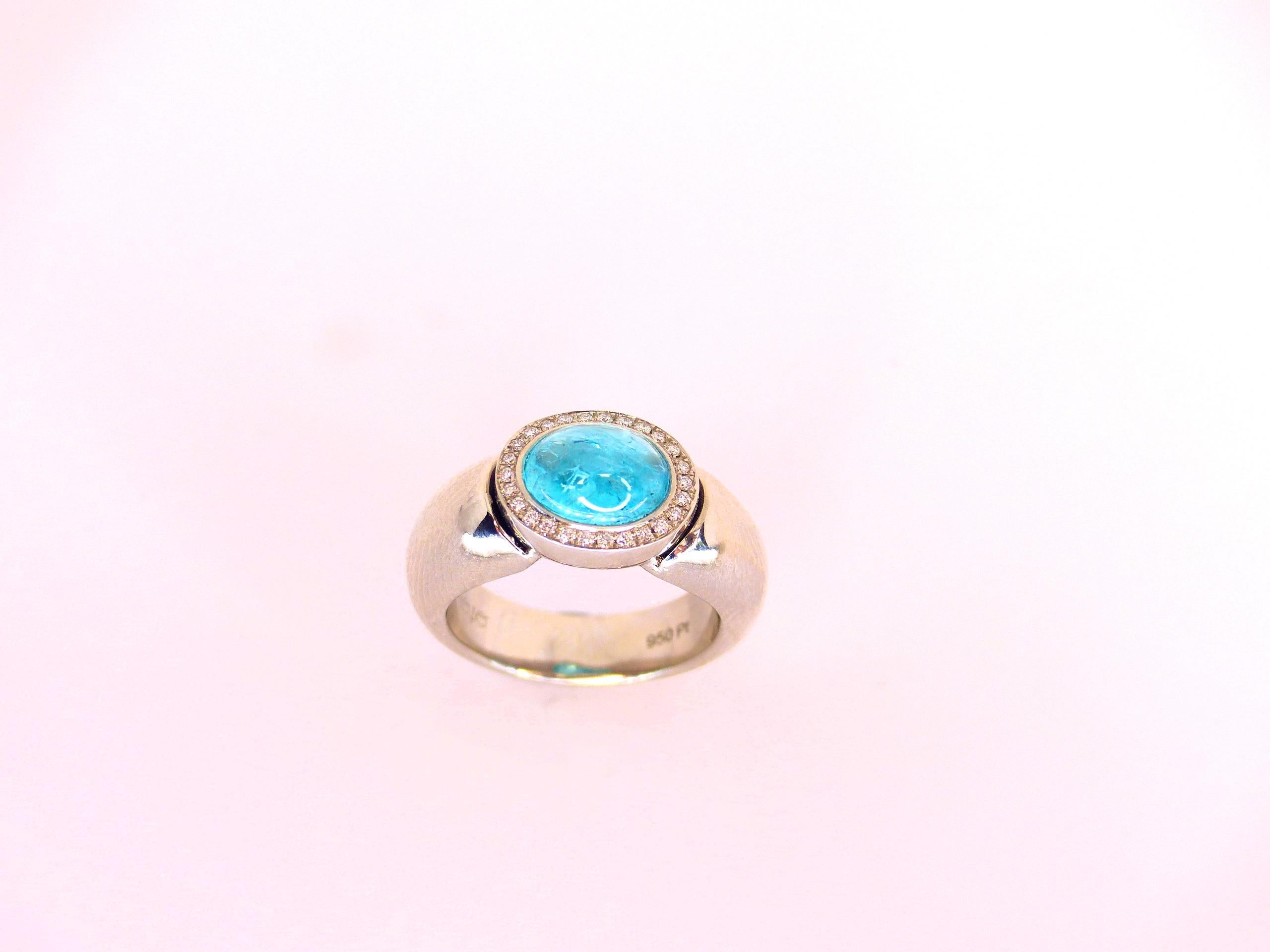 Contemporary Ring in Platinum with 1 Paraiba Tourmaline Cabouchon Oval 9x7mm and 26 Diamonds  For Sale