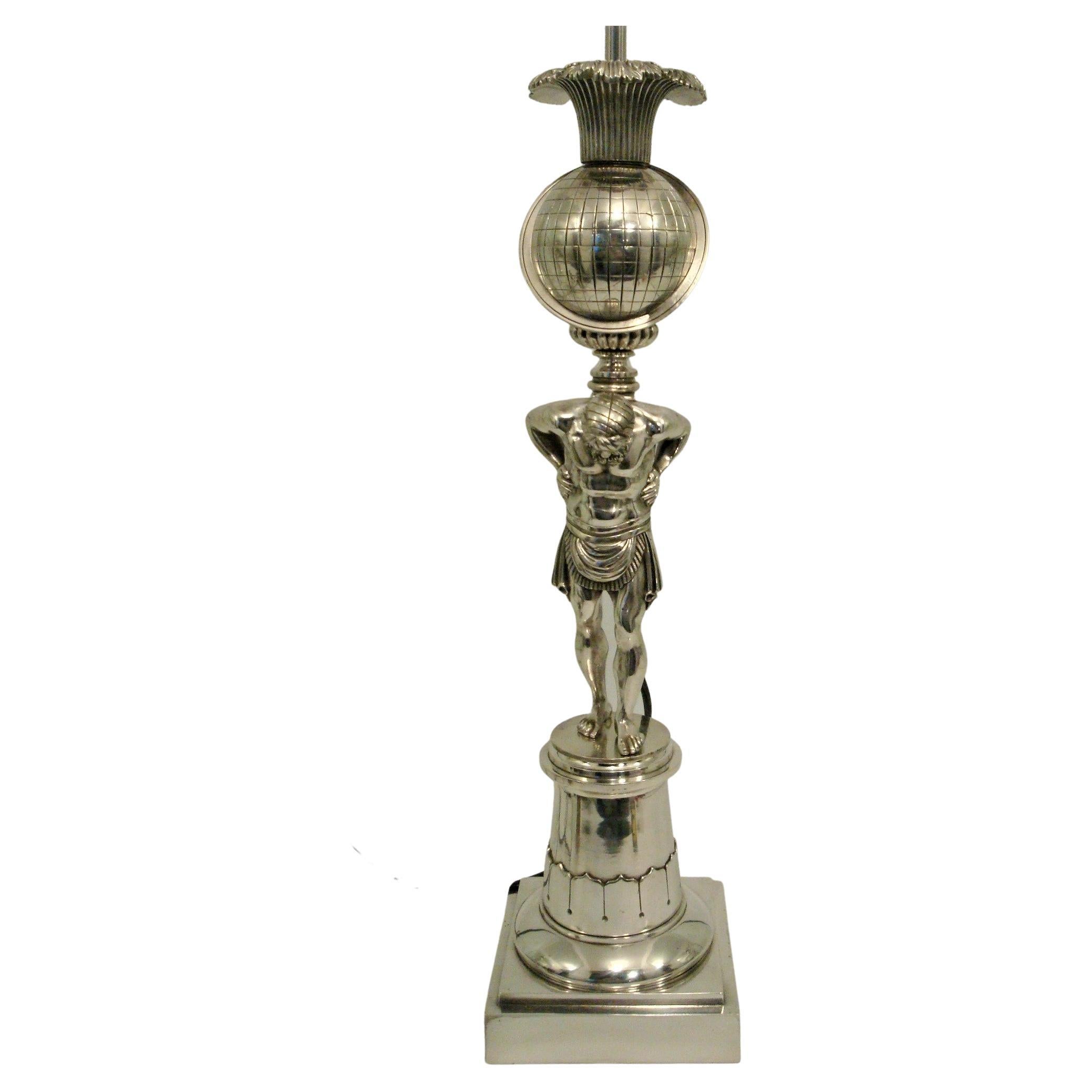 Base per lampada in bronzo argentato con scultura 'Atlas' di Thomas Messenger and Sons, Inghilterra, circa 1835.

Lampada da tavolo inglese del periodo Guglielmo IV, in bronzo, della ditta Thomas Messenger and Sons di Birmingham, raffigurante