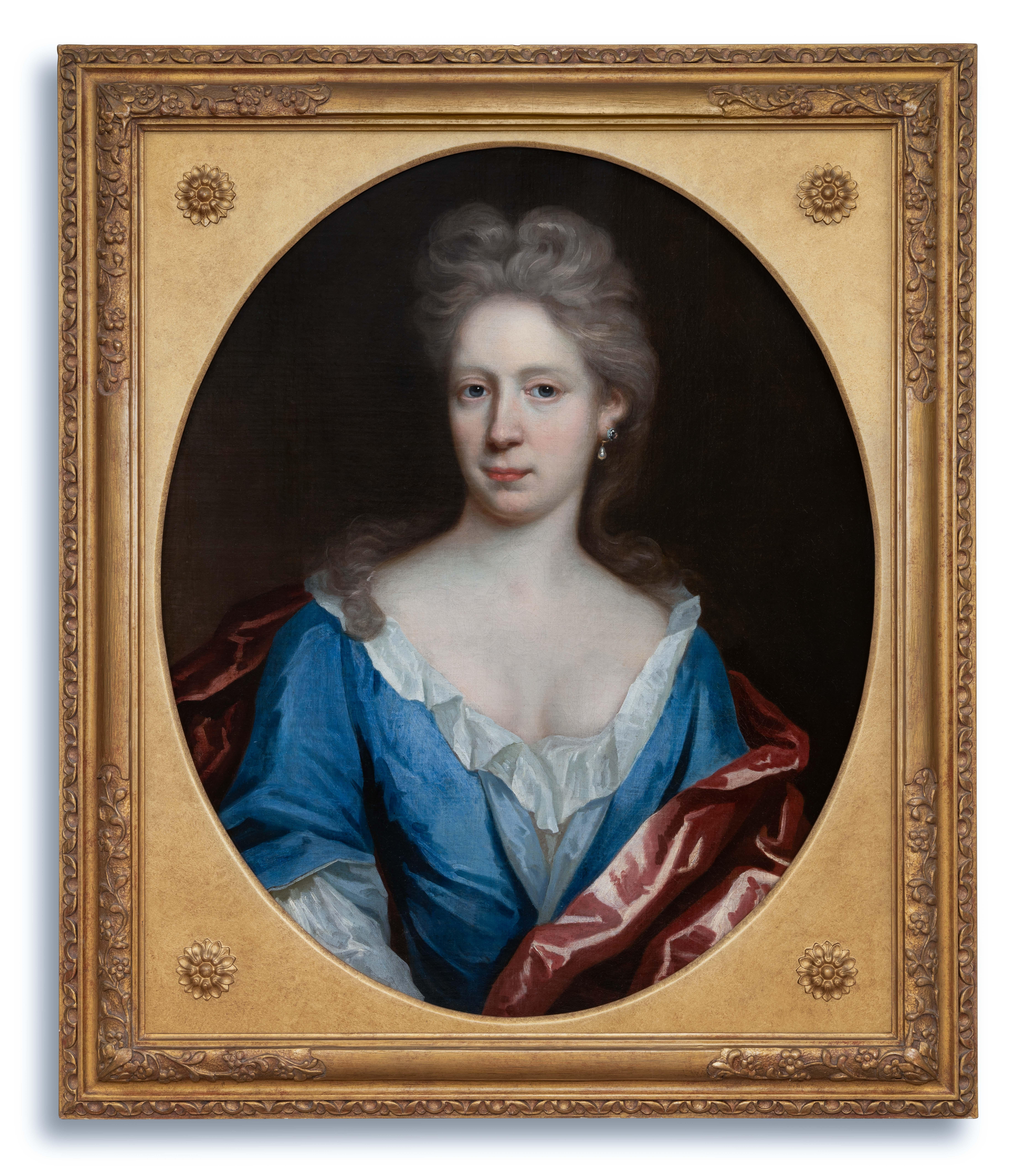 The sitter is elegantly attired in a blue silk dress over a white frilled chemise and a striking crimson mantle.  The artist, Thomas Murray, can be described as one of the most successful and talented during the last part of the seventeenth century.
