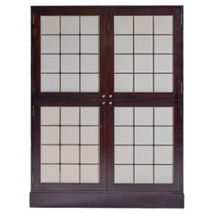 Thomas Pheasant per Baker Armadio in mogano, ottone e pelle Thomas Pheasant per Baker Armadio in mogano, ottone e pelle