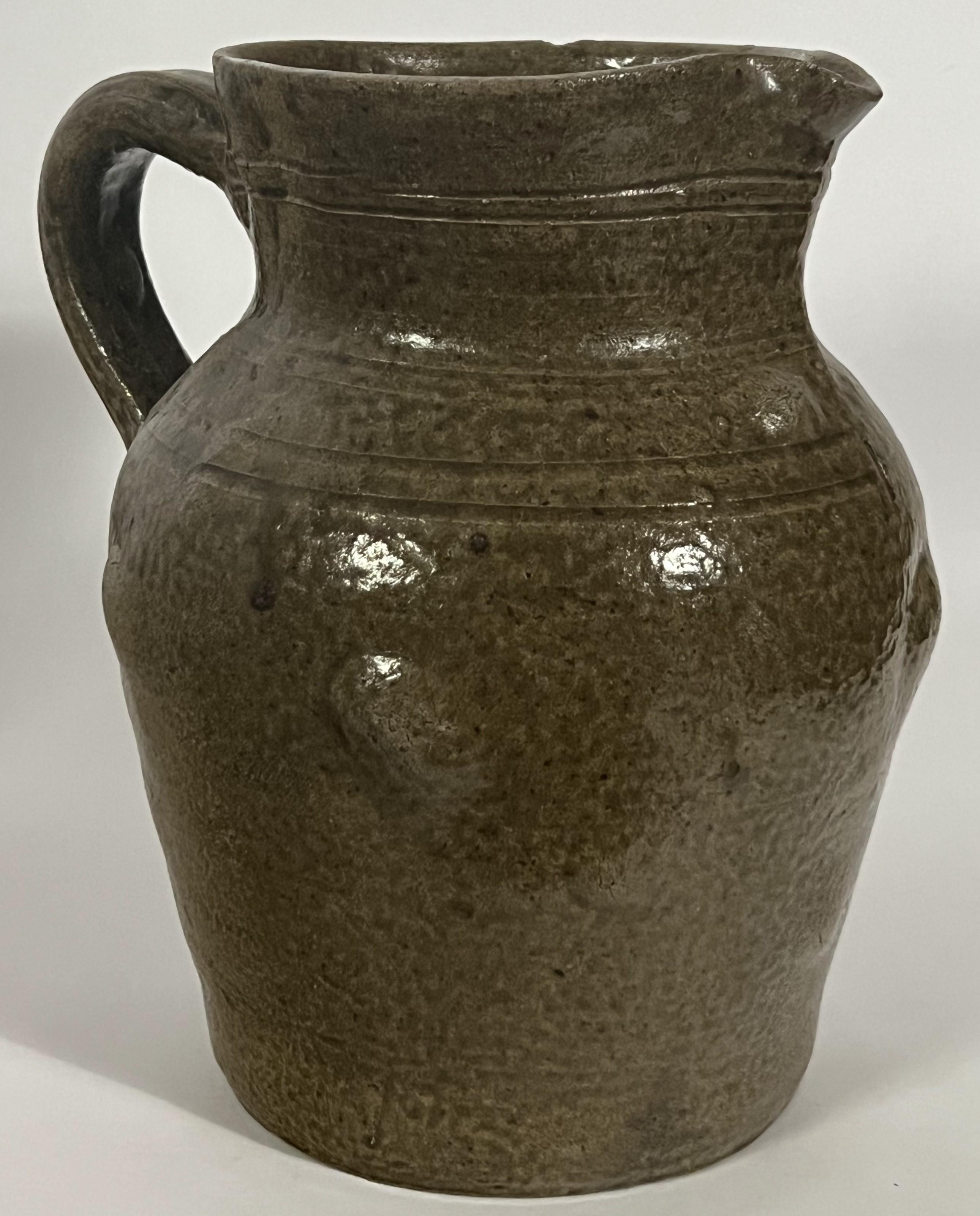 stoneware pitcher antique