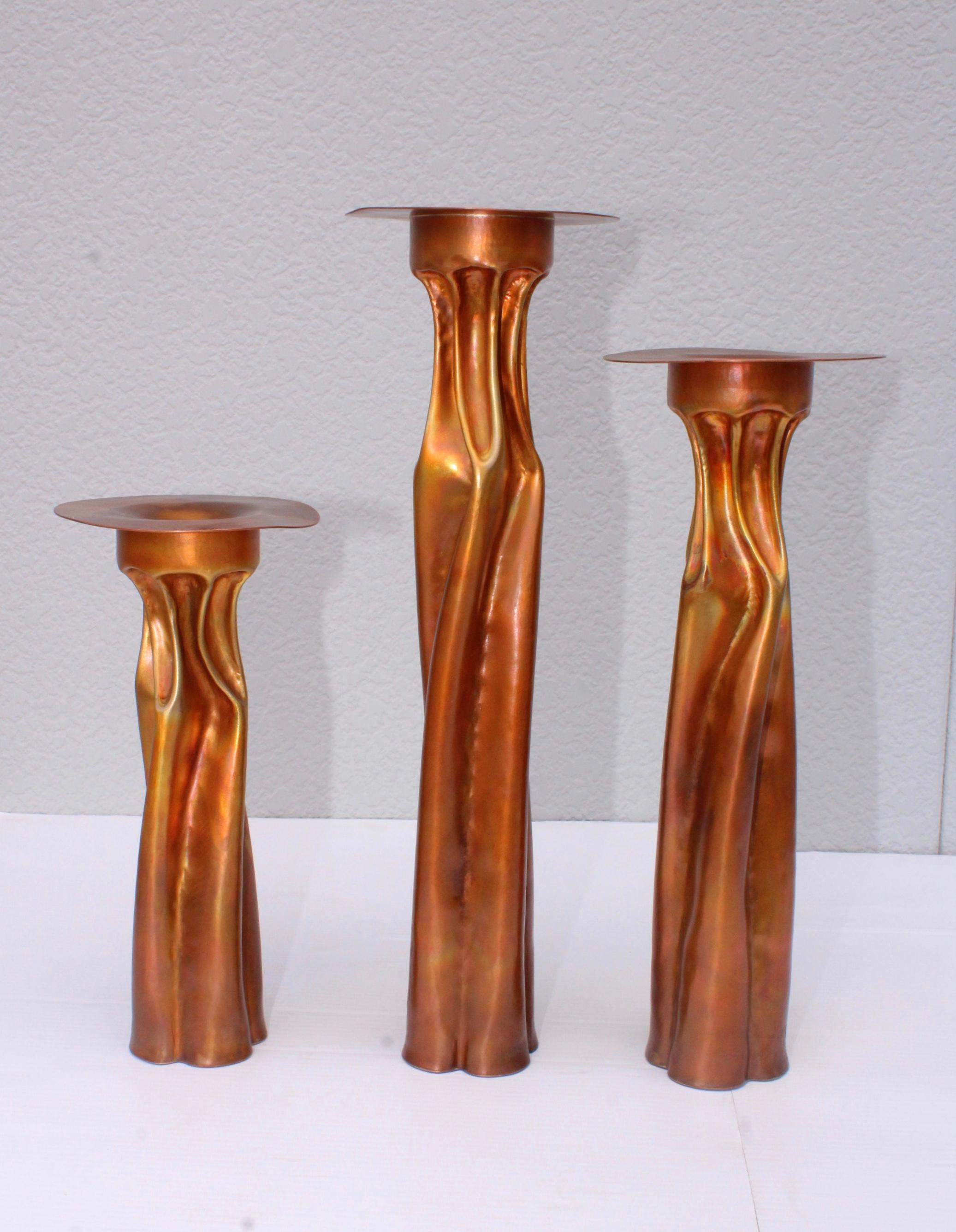 1970s handcrafted copper Brutalist candleholders by Thomas Roy Markusen, in vintage original condition with minor wear and patina.

Measures: Medium candleholder height 16