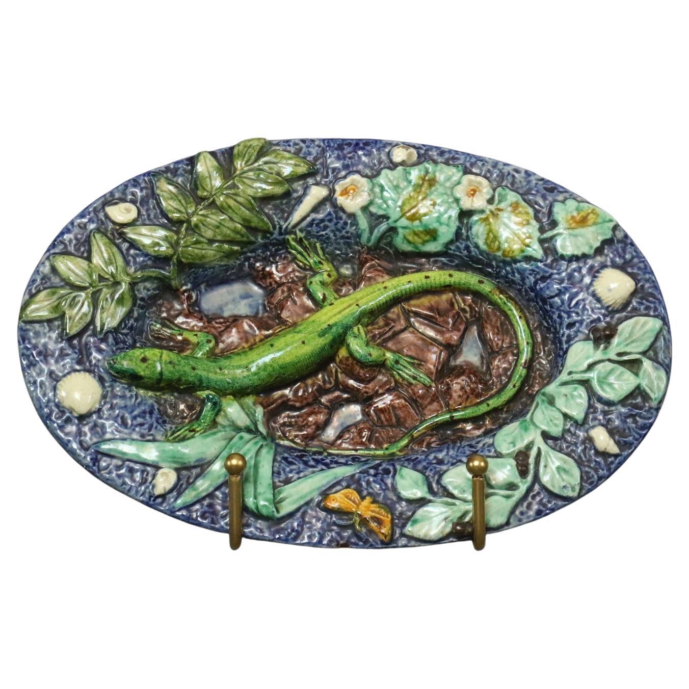 Thomas Sergent French Palissy Ware circa 1880 Lizard trompe l'oeil

It is a very beautiful object in majolica representing a lizard in trompe l'oeil on a decor nature-inspired.

This ceramic is characteristic of the work of the period and Thomas