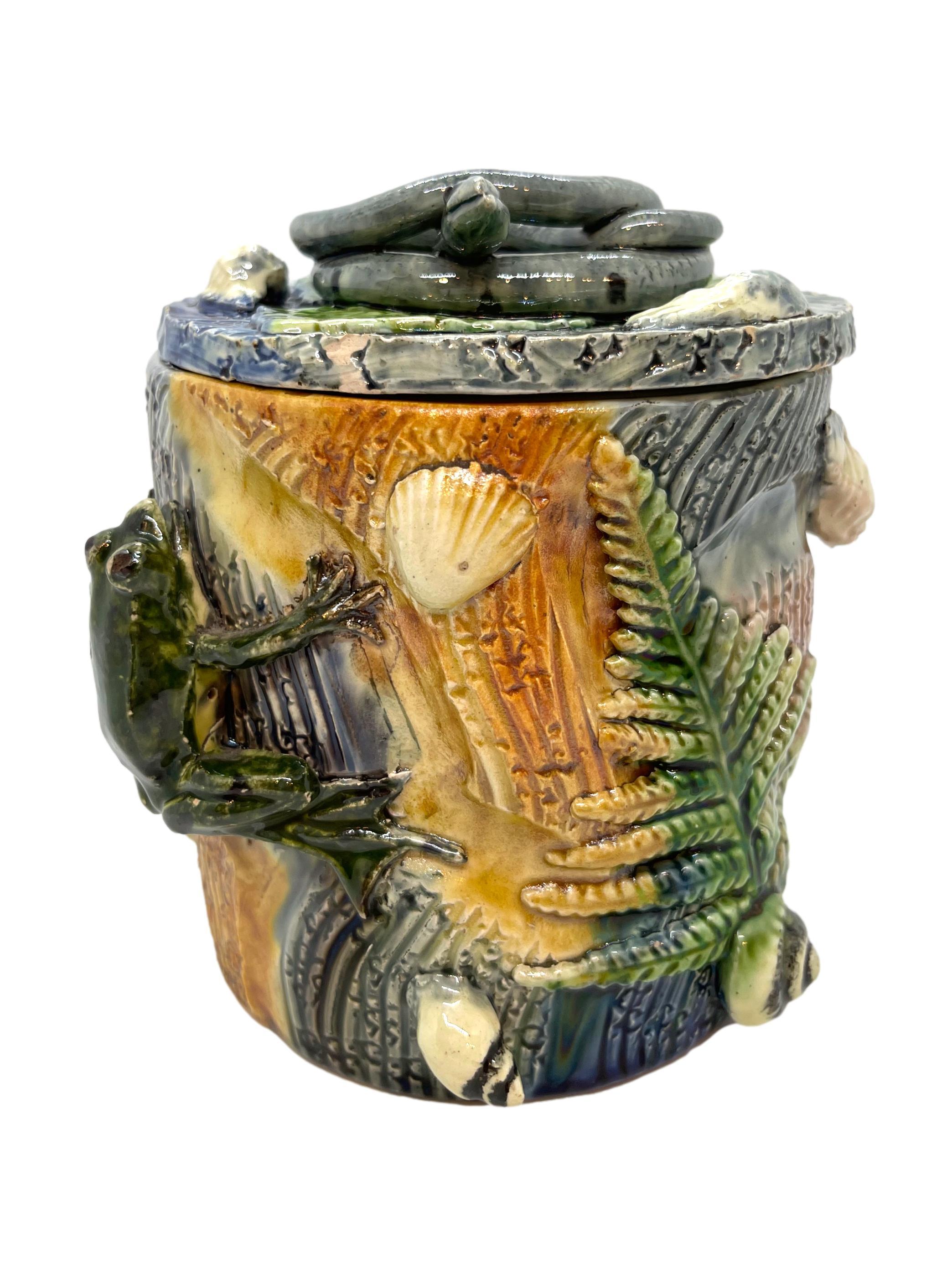 French Palissy Ware Majolica Trompe l'oeil humidor/tobacco jar by Thomas-Victor Sergent, (French, 1830-1890). The reverse signed with the impressed initials 'T.S.' for Thomas Sergent. 
Sergent was an important member of the School of Paris; he