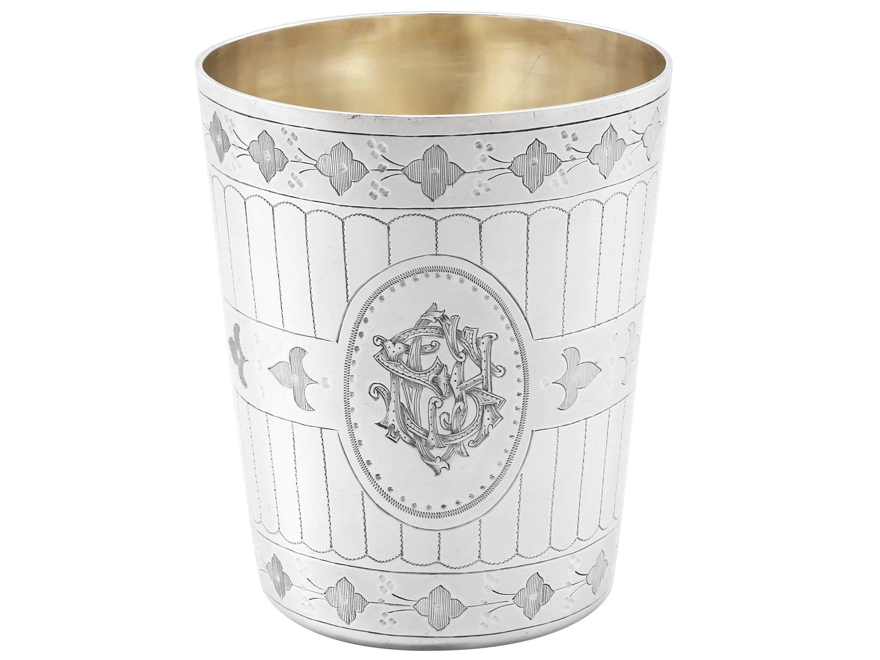 An exceptional, fine and impressive antique Victorian English sterling silver beaker, boxed; an addition to our ornamental silverware collection.

This exceptional antique Victorian sterling silver beaker has a tapering cylindrical form.

The