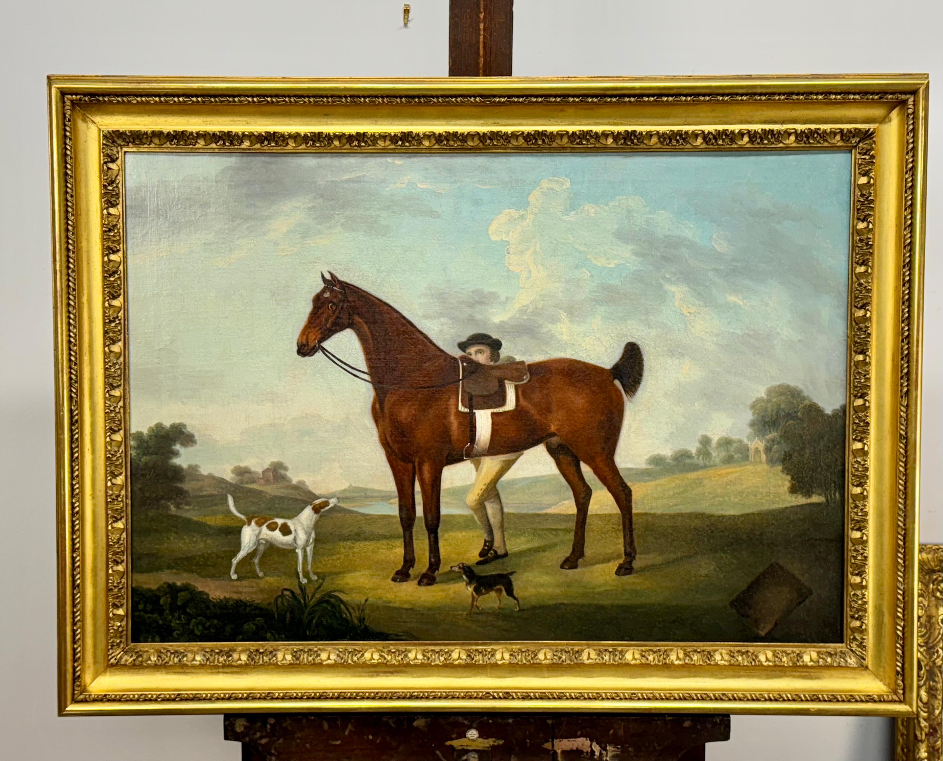 Thomas Stringer (1722-1790)
Uno stalliere con un cacciatore baio sellato e cani, in un vasto paesaggio
Datato 1754 in basso a sinistra
Olio su tela
Dimensioni non incorniciate 25 x 36 pollici
Dimensioni incorniciate 31 x 42 pollici

Provenienza: