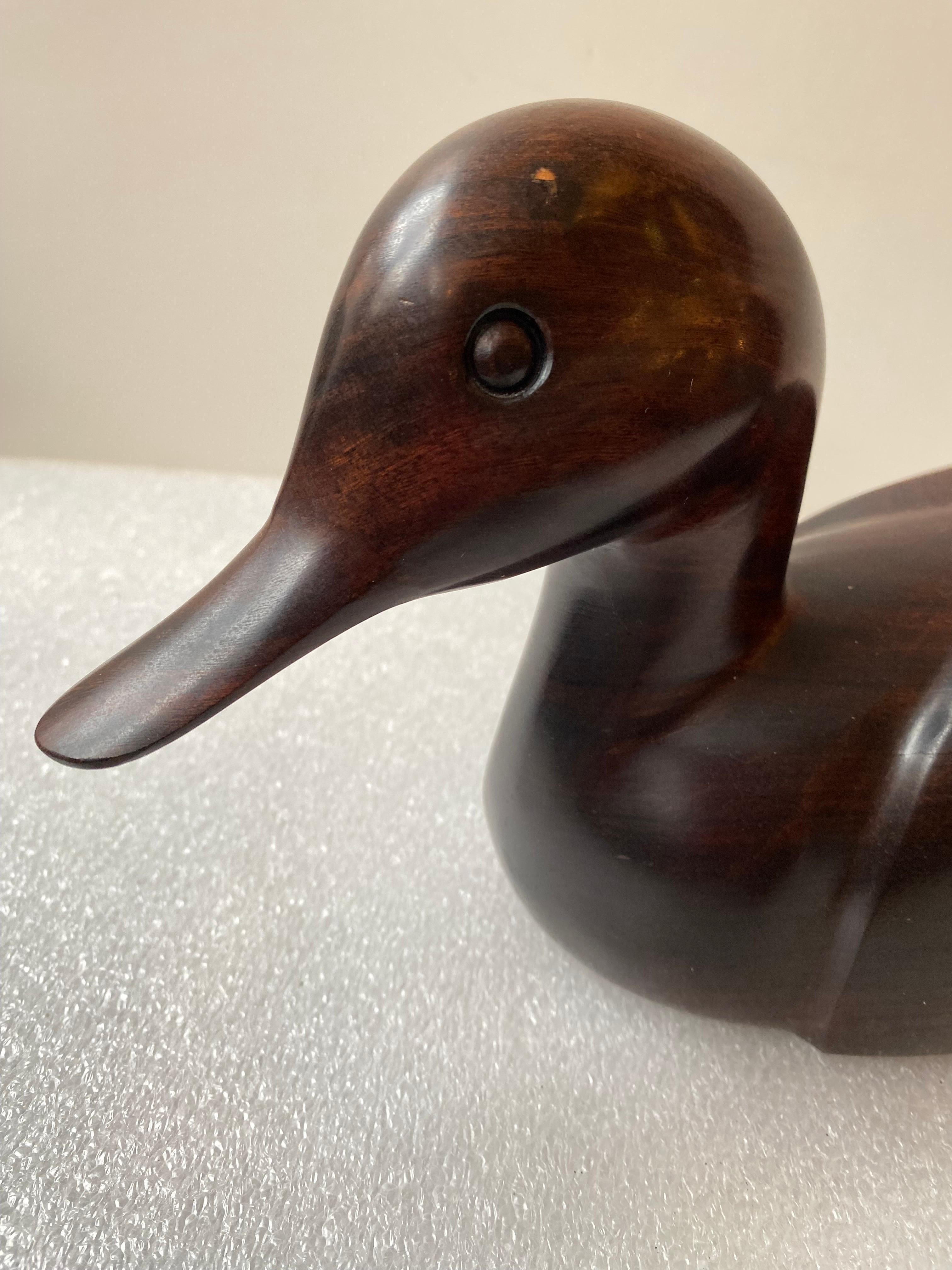 Thomas Suby carved duck sculpture. Represented by Breckenridge Art Gallery/ Breckenridge Colorado. This piece probably dates to the Mid-1980s. Beautifully done and amazing wood! Possibly Sonoran Ironwood.