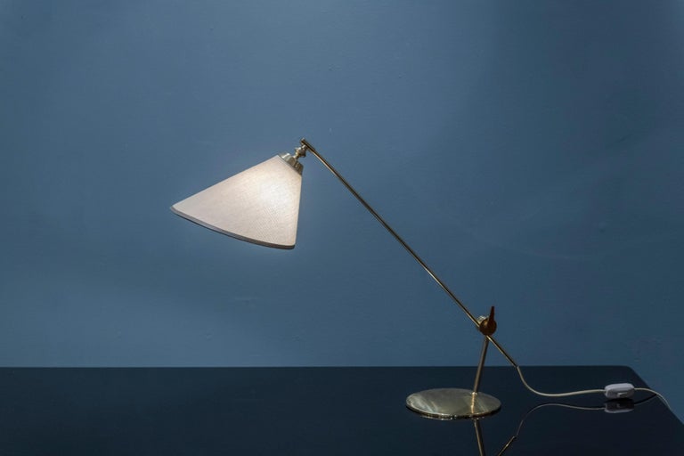 Thomas Valentiner design table lamp for Poul Dinesen, Denmark. Elegant desk lamp or for a console in very good original condition, wired for U.S. and ready to install.
