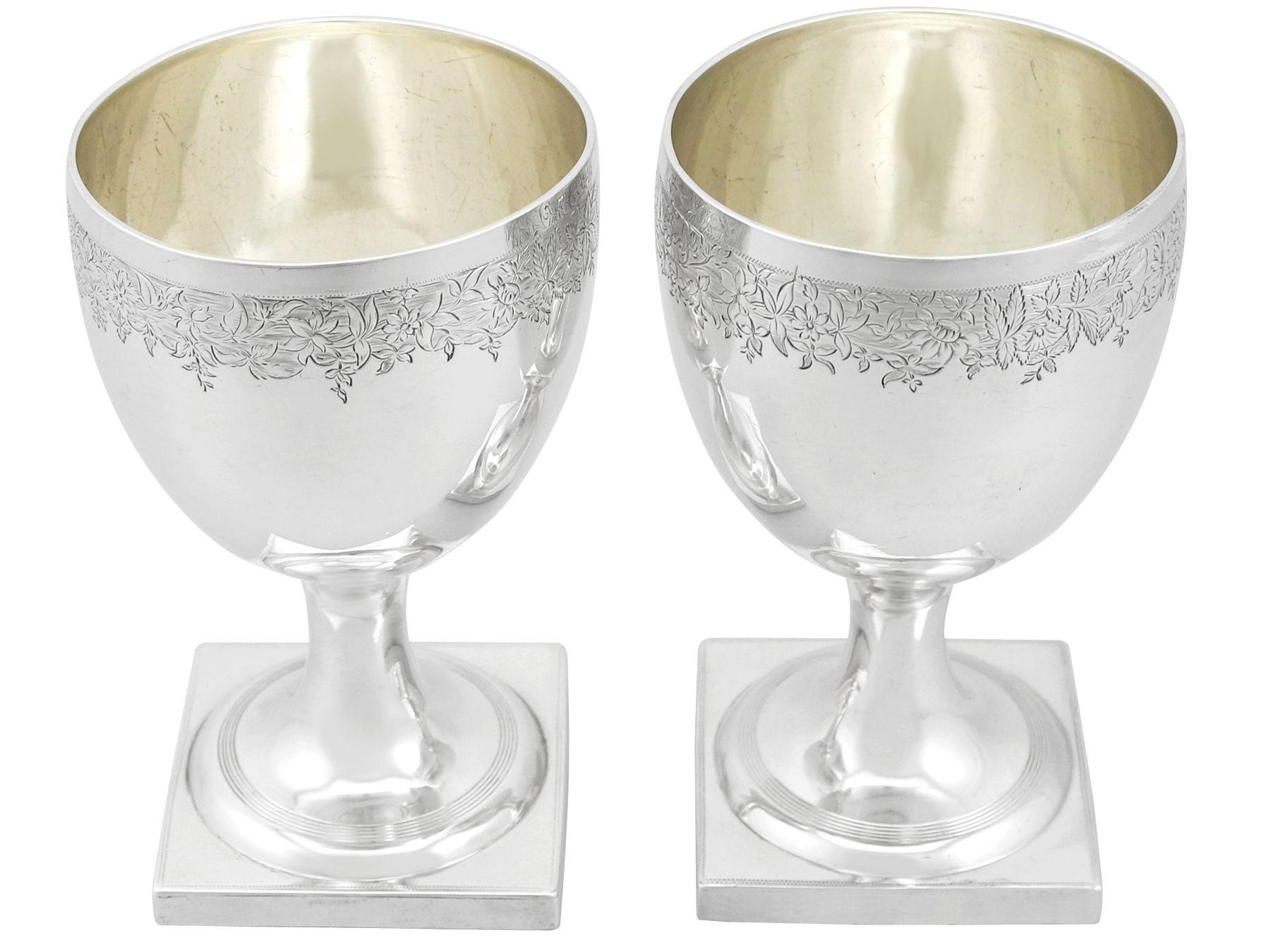 An exceptional, fine and impressive pair of antique Georgian English sterling silver goblets; an addition to our range of wine and drink related silverware.

These exceptional antique George III English sterling silver goblets have a plain