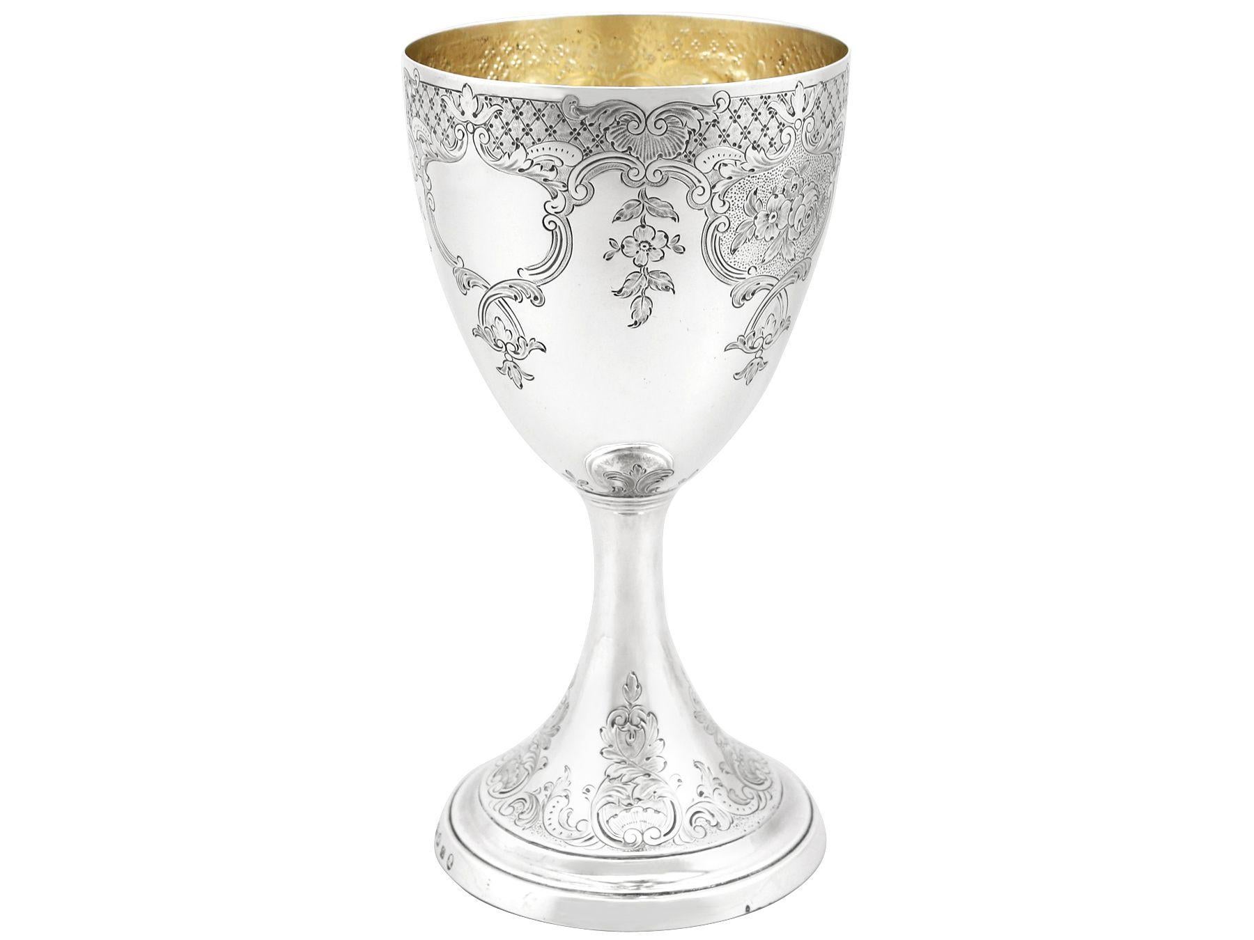 An exceptional, fine and impressive antique George III English sterling silver wine goblet; an addition to our Georgian wine and drinks related silverware collection.

This exceptional antique Georgian sterling silver wine goblet has a plain