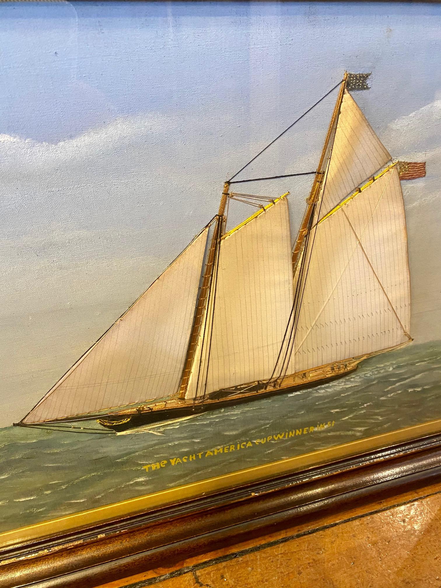 Antique silk embroidered yacht portrait by Thomas Willis (1850-1925), depicting the schooner-rigged racing yacht America, the winner of the 1851 America's Cup Race. This was the very first 100 Guineas Cup Regatta, whose wildly shocking upset result