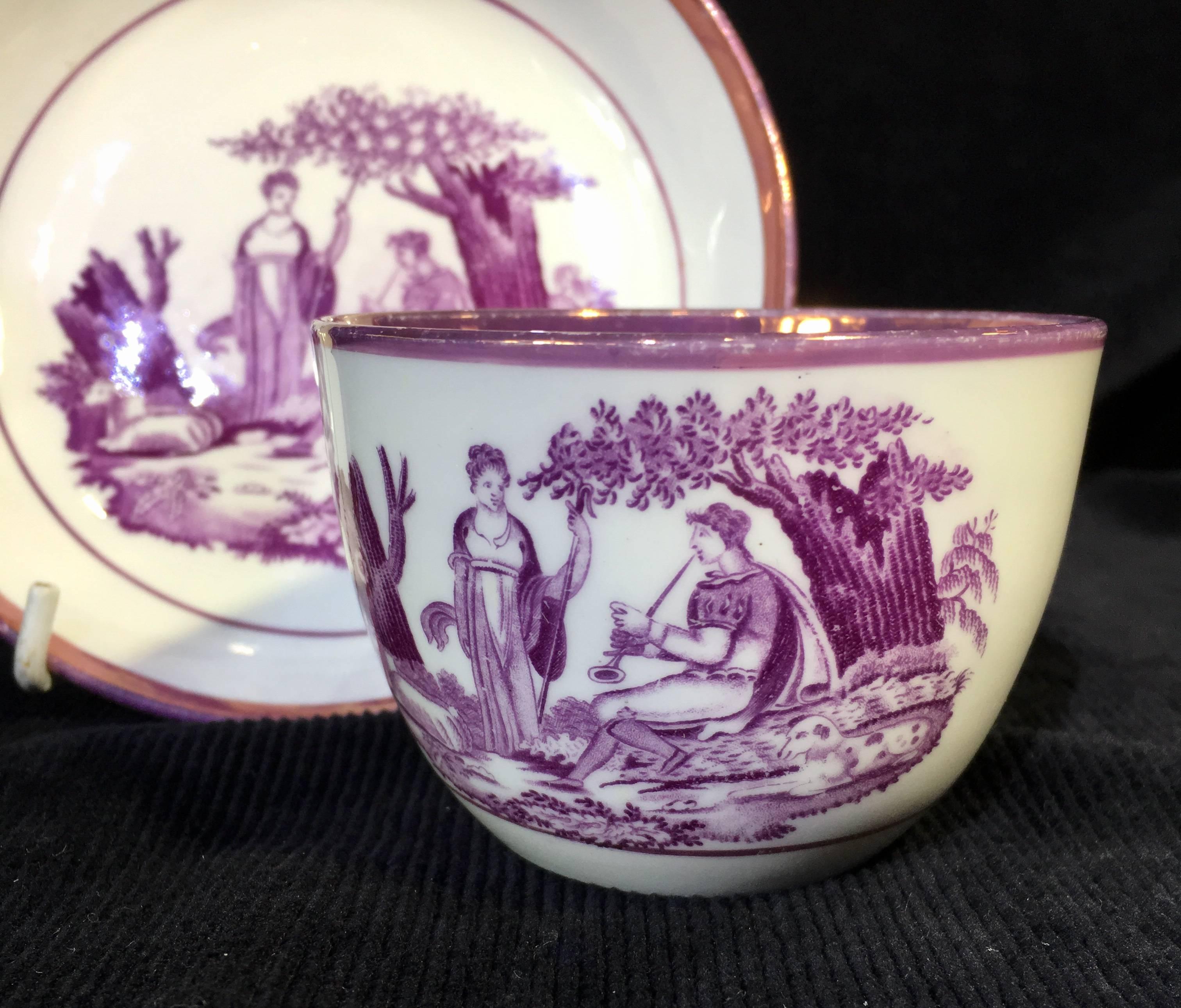 Thomas Wolfe & Co cup and saucer, bat printed with the shepherdess pattern in purple, with in purple lustre rims,
circa 1815.