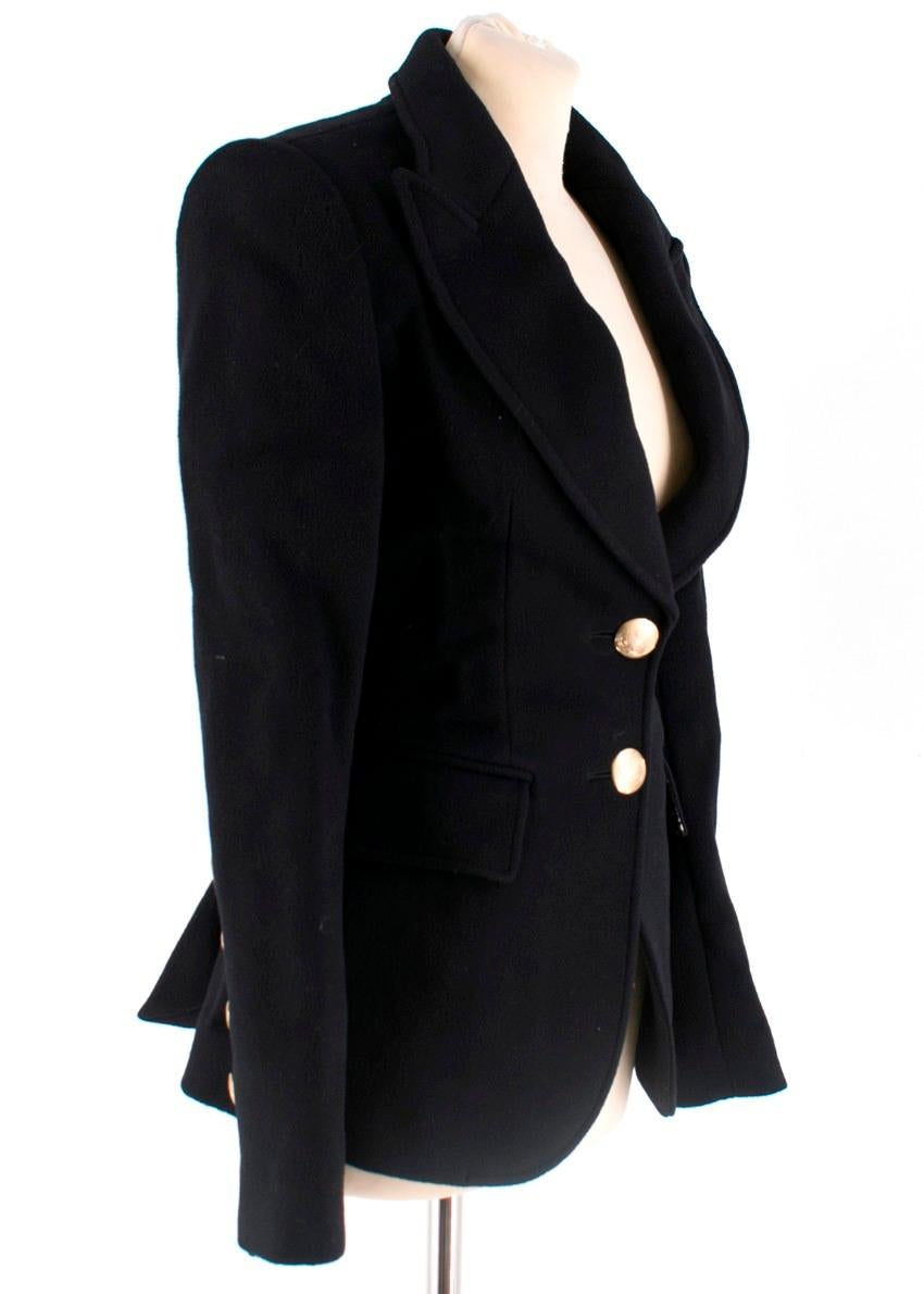 Thomas Wylde elegant black blazer designed with peaked lapels, structured shoulders, a broad welt chest pocket and a front gold-tone button fastening.

- Silver-tone embossed snakes at the back
- Long sleeves
- Gold-tone buttons on sleeves
- Side