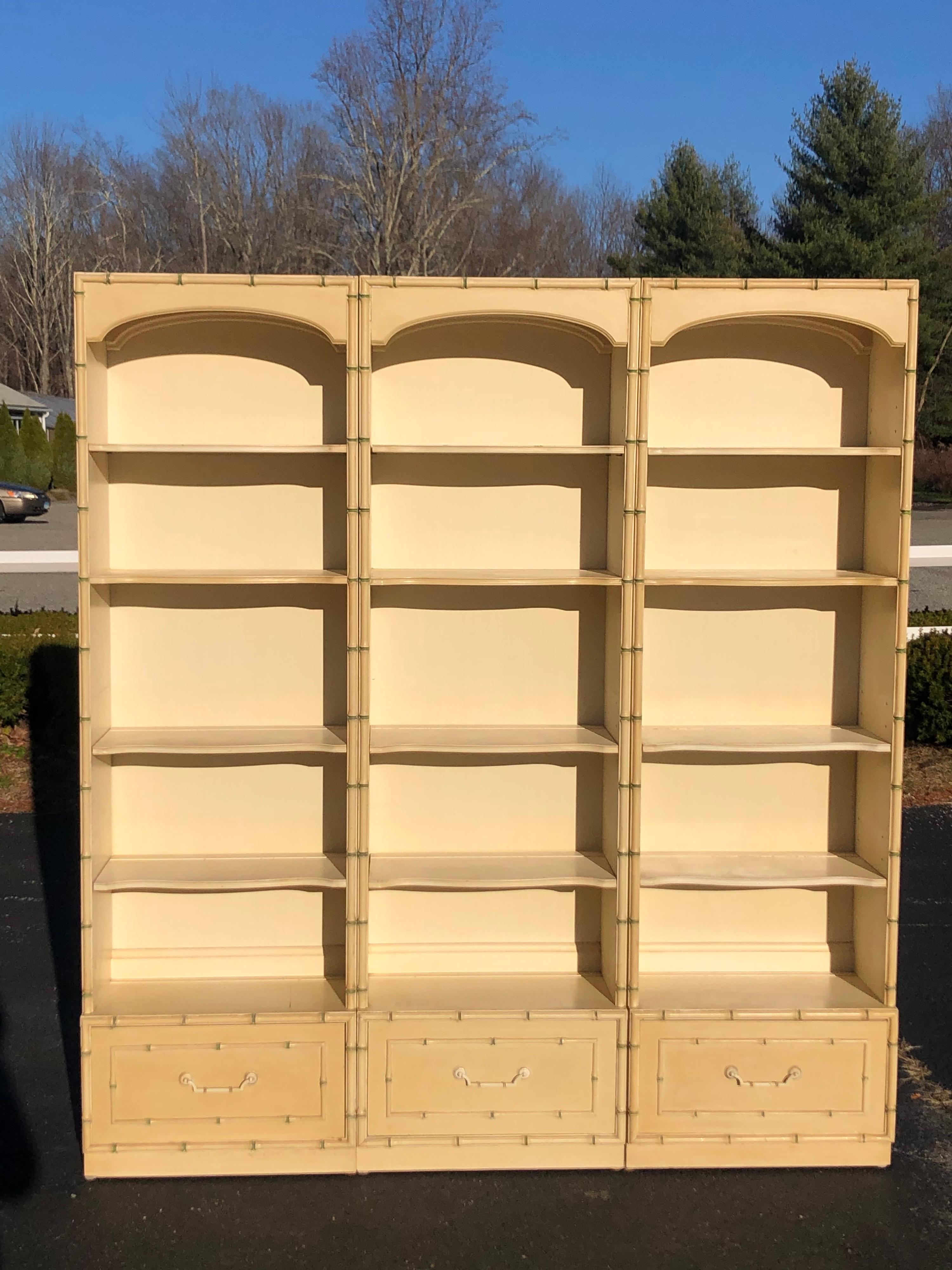 Thomasville Allegro faux bamboo bookcase wall set. Classic design and timeless style. These three bookcases can be used together or separately apart. Willing to break up set. Soft cream yellow with light off white and soft olive green accents. Each