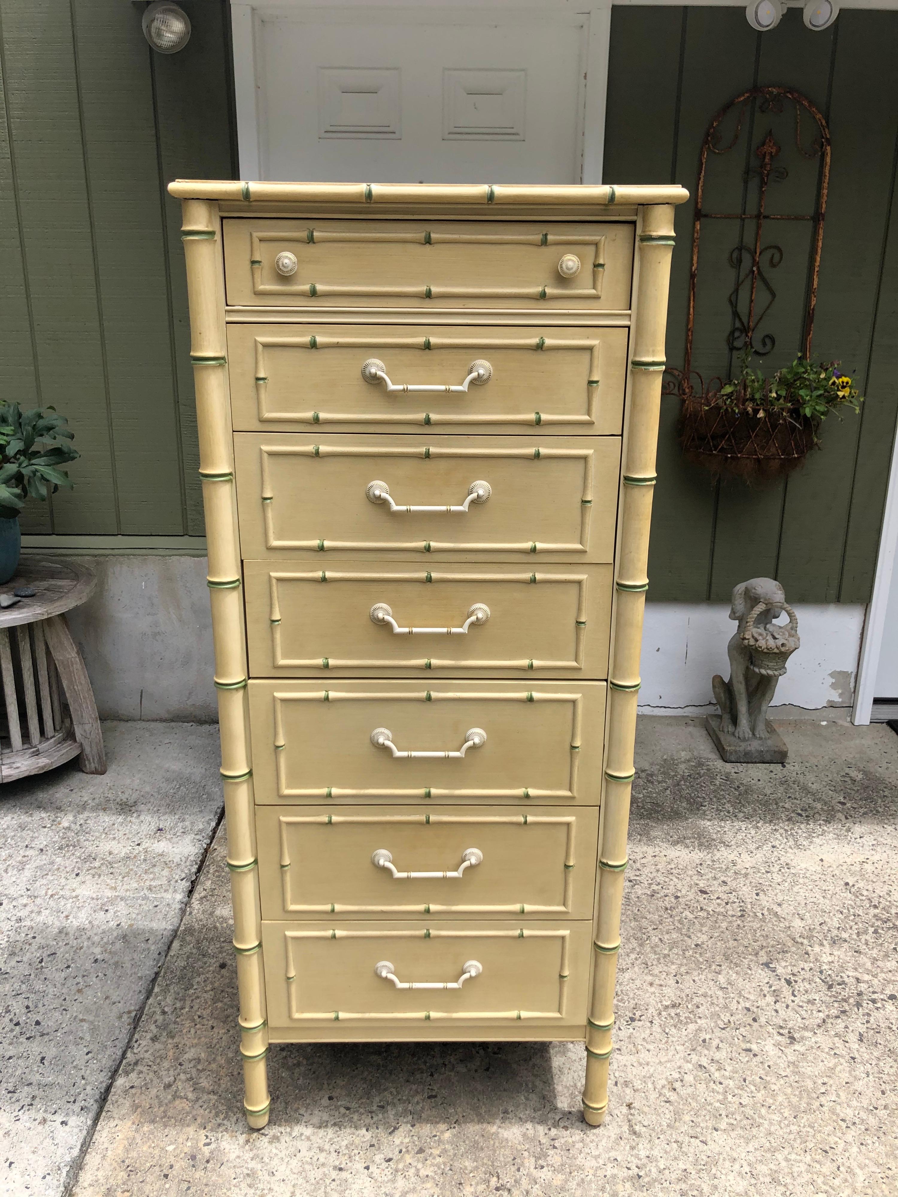 Thomasville Allegro faux bamboo lingerie chest. In the style of Henry Link. Gorgeous semanier in soft yellow with green accents. Solid metal pulls with gold and white wash. Classic designer piece with incredible detailing. This piece will never to