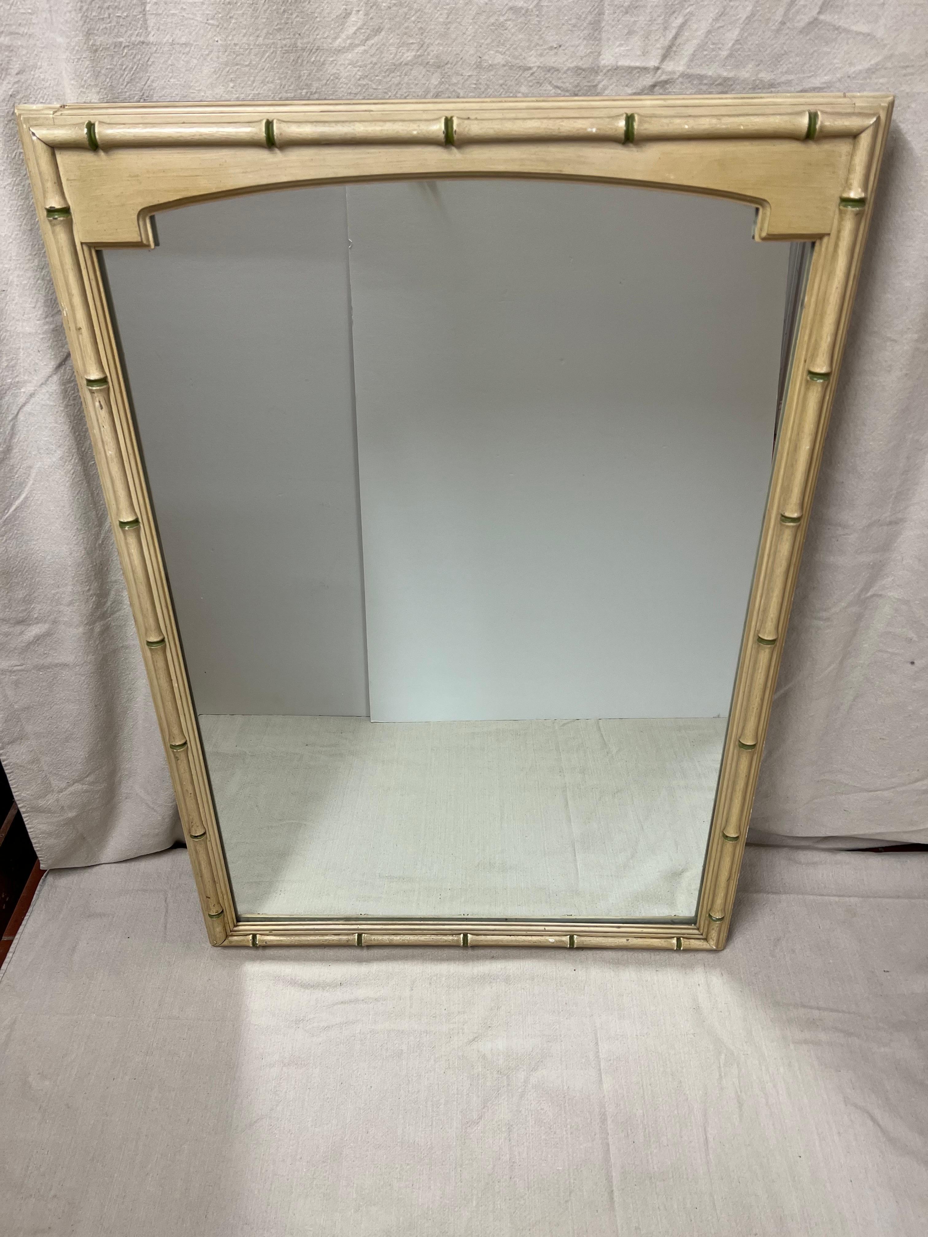 Thomasville allegro faux bamboo mirror. Nice pale creamy yellow with green highlights. 
Perfect for above a dresser or in a hallway. Heavy solid wooden construction.