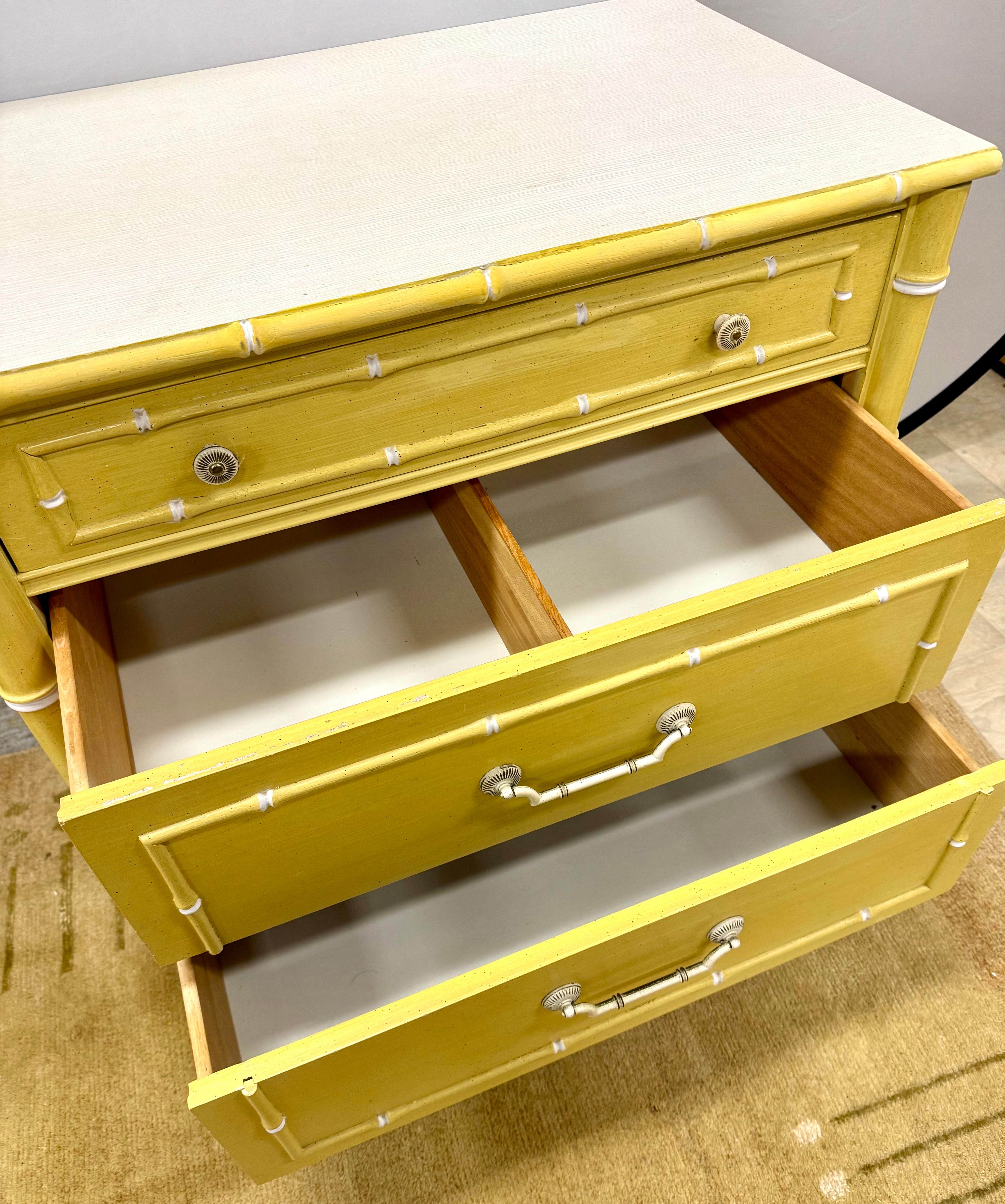 Rare and highly sought-after Thomasville Allegro small chest from 1963 is a stunning example of mid-century modern design with Chinoiserie influences. Featuring faux bamboo details and a vibrant yellow finish, this three drawer chest is both