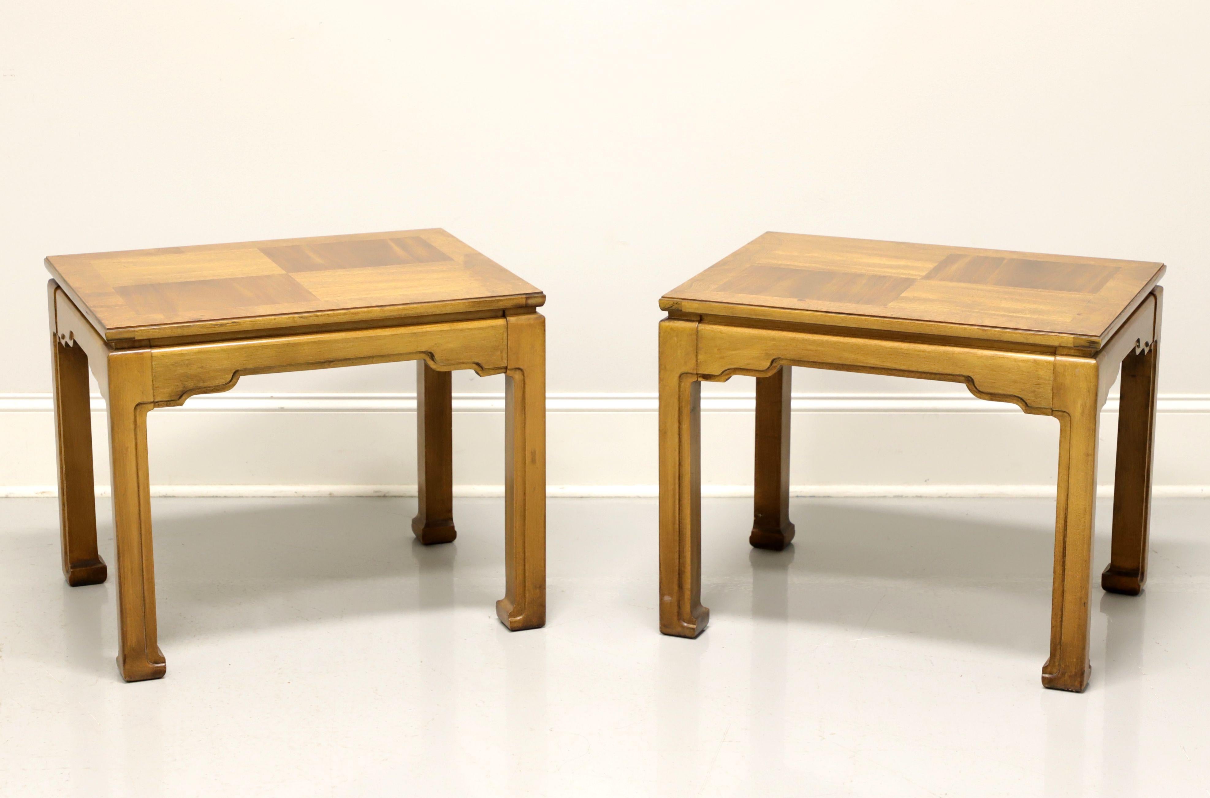 A pair of Asian Ming influenced side tables by Thomasville. Oak with burl oak parquetry design to top, Ming style apron and legs. Made in North Carolina, USA, circa 1988.

Style #:  10831-210

Measures: 20W 26D 21.25H

Exceptionally good condition