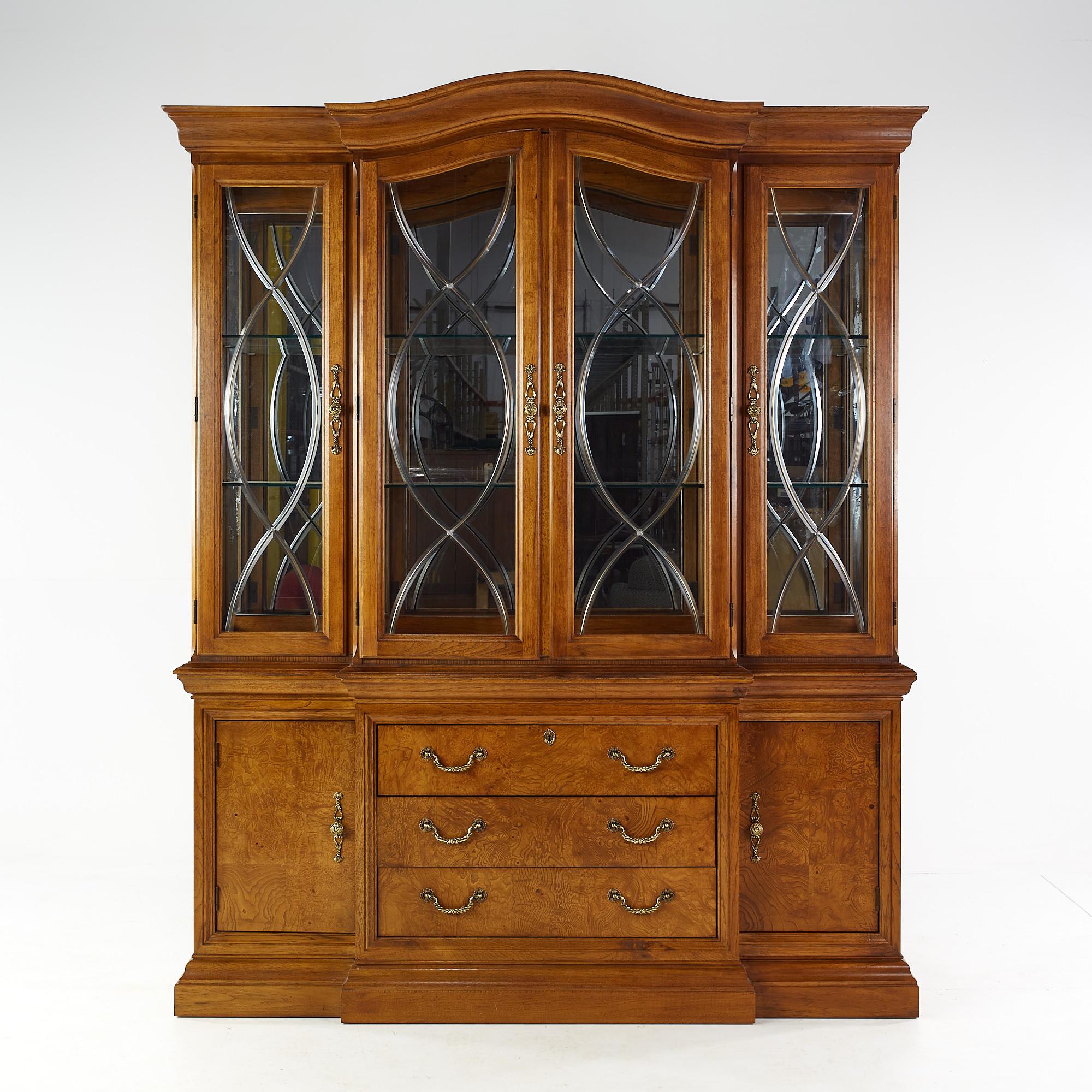 Thomasville Burlwood and walnut China cabinet

The buffet measures: 70 wide x 18 deep x 32.25 inches high
The hutch measures: 71.75 wide x 18.75 deep x 56.5 inches high
The combined height of the buffet and hutch is 88.75 inches

This piece is