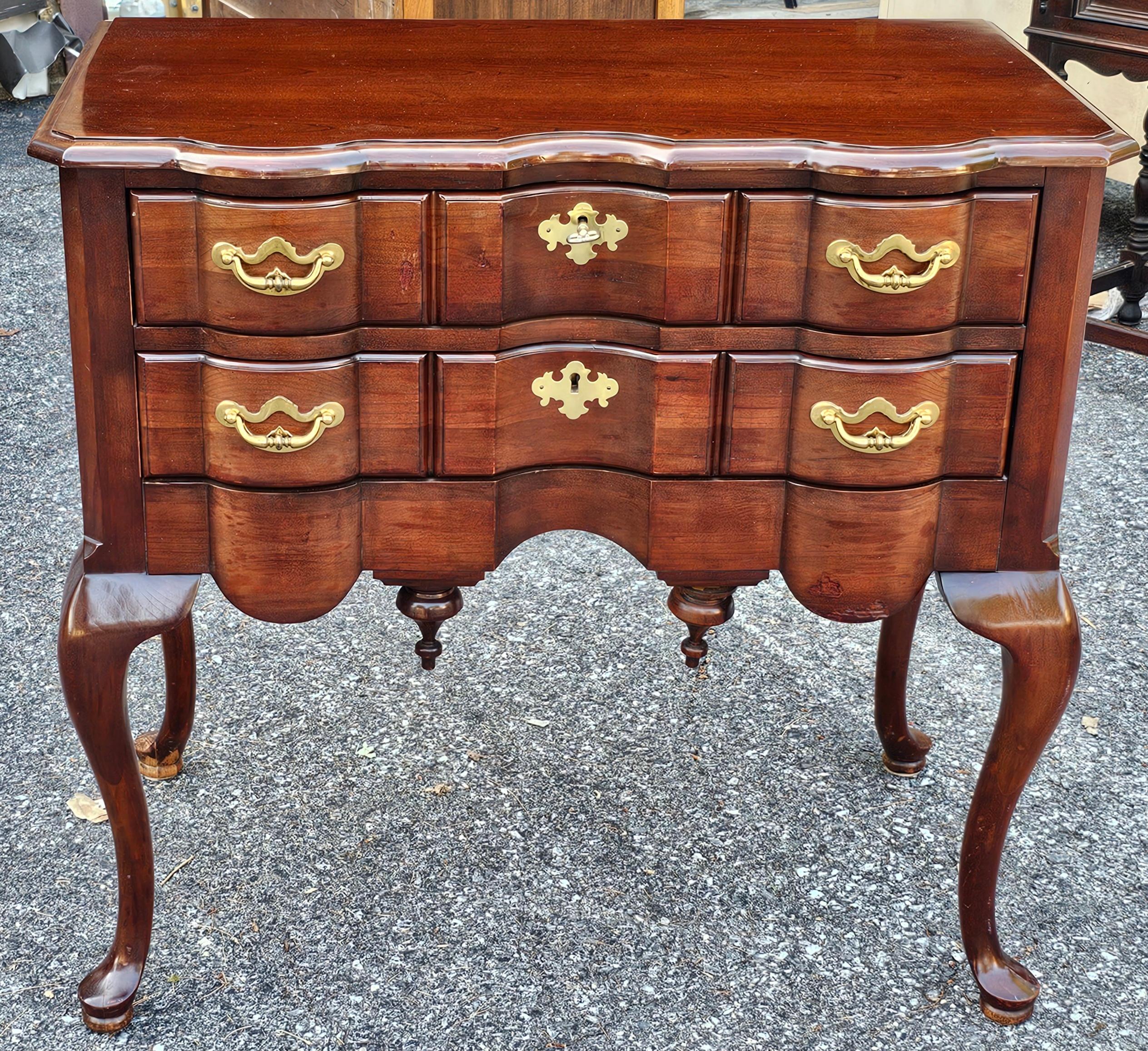 An Exceptional Thomasville Collector's Cherry collection Silver Anniversary Blockfront Lowboy Server in the Queen Anne Style. Great hidden silver chest as well.
 

