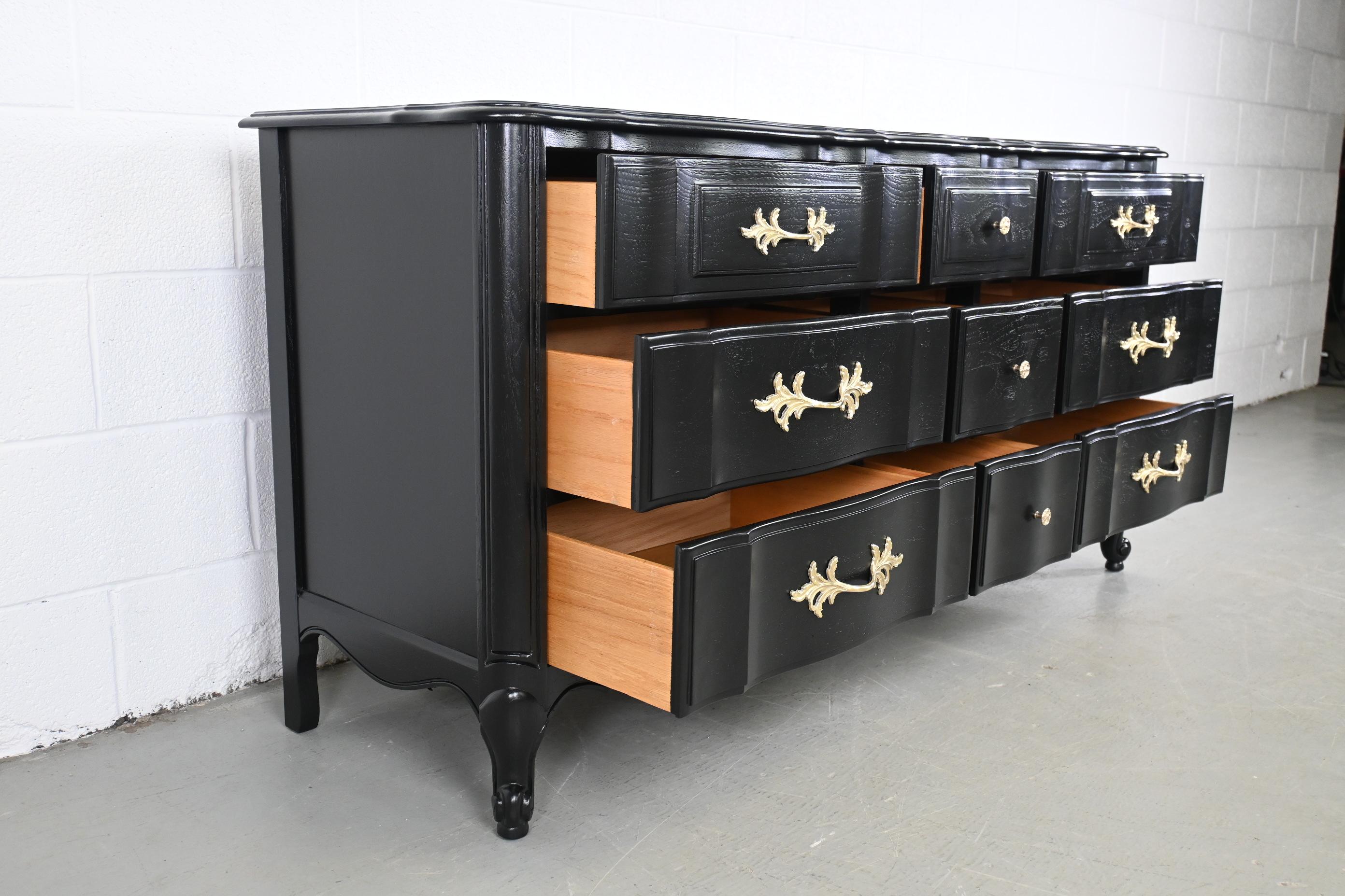 Late 20th Century Thomasville French Provincial Black Lacquered Nine-Drawer Dresser For Sale