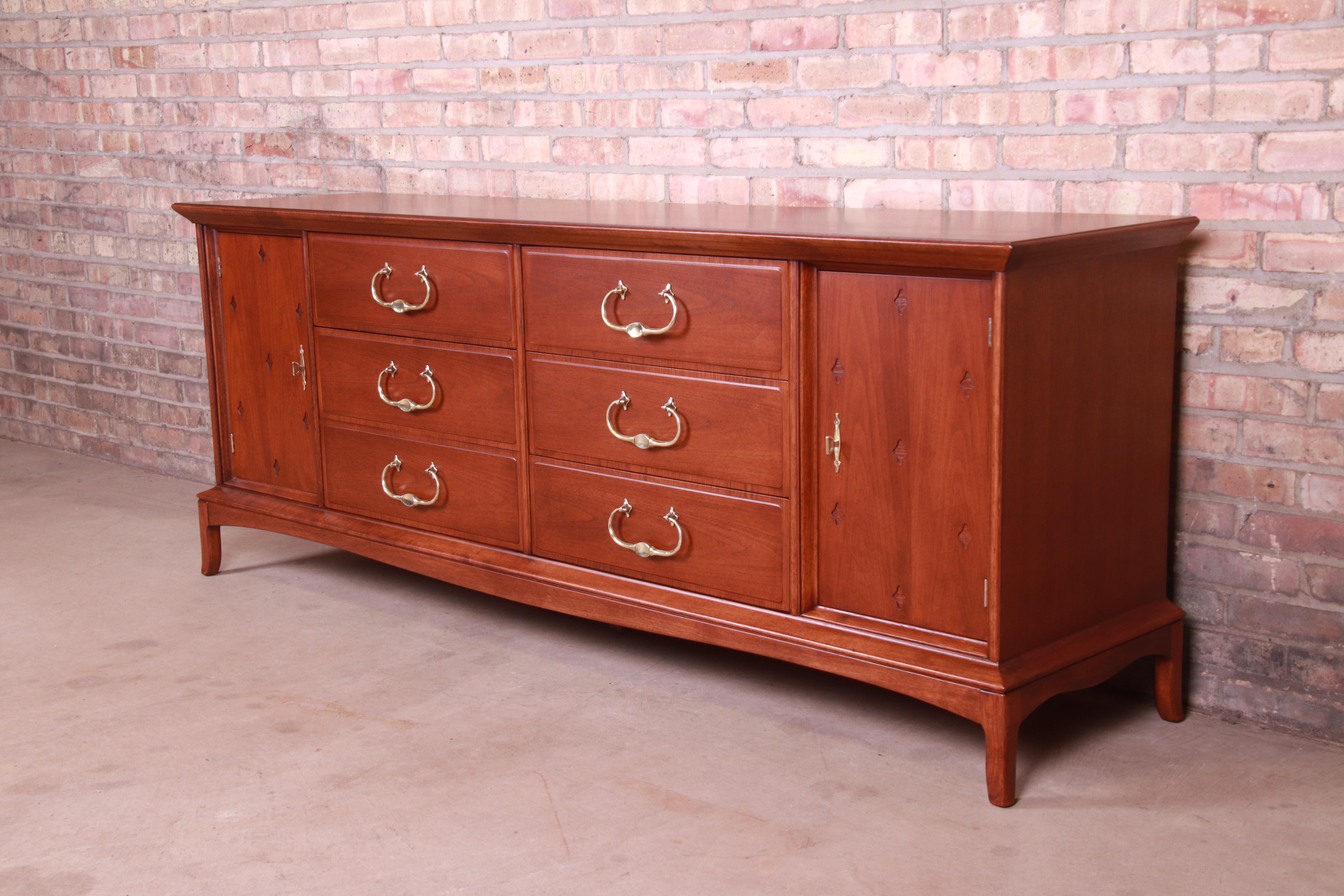 A gorgeous Mid-Century Modern Hollywood Regency Chinoiserie twelve-drawer long dresser or credenza

By Thomasville, 