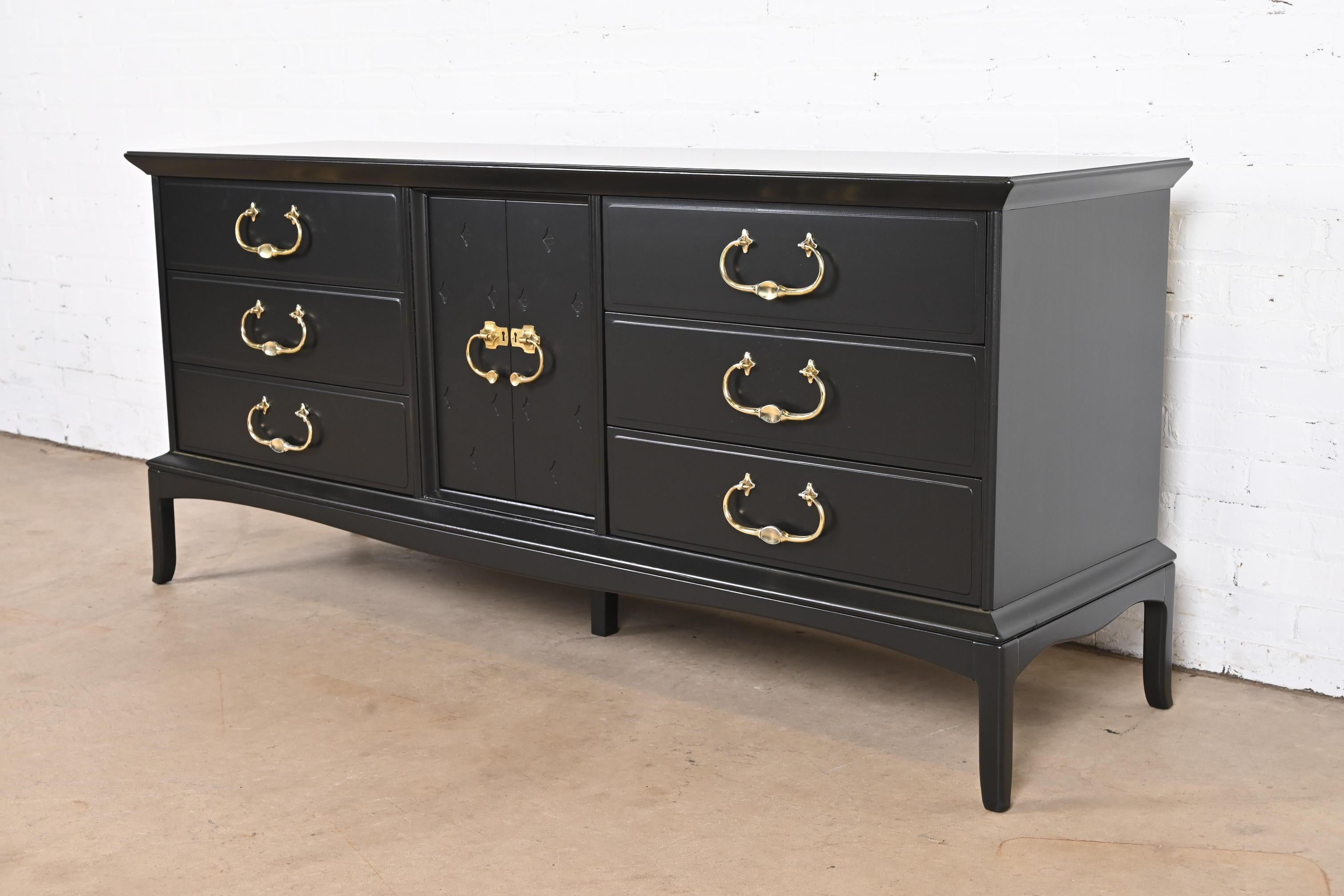 A gorgeous mid-century modern Hollywood Regency nine-drawer long dresser or credenza

By Thomasville, 