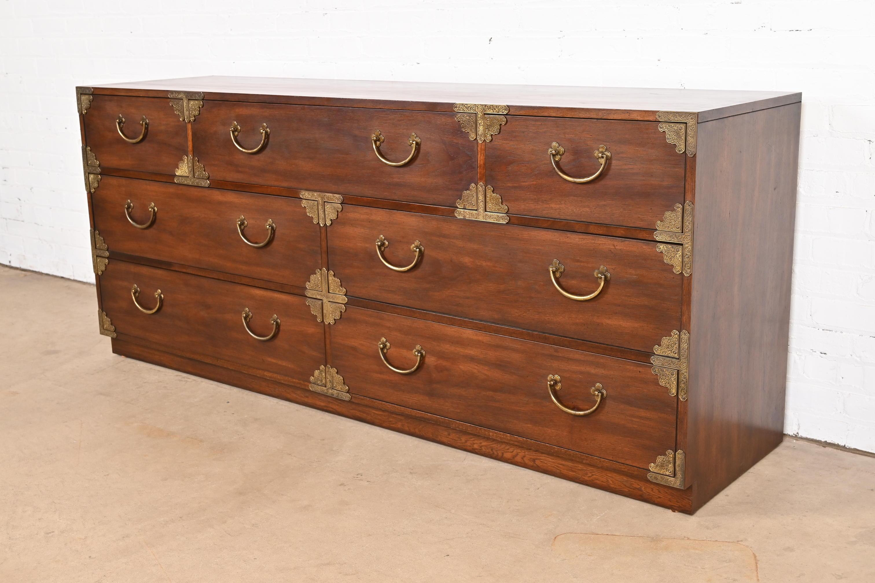 Thomasville Mid-Century Hollywood Regency Campaign Walnut Dresser or Credenza In Good Condition For Sale In South Bend, IN