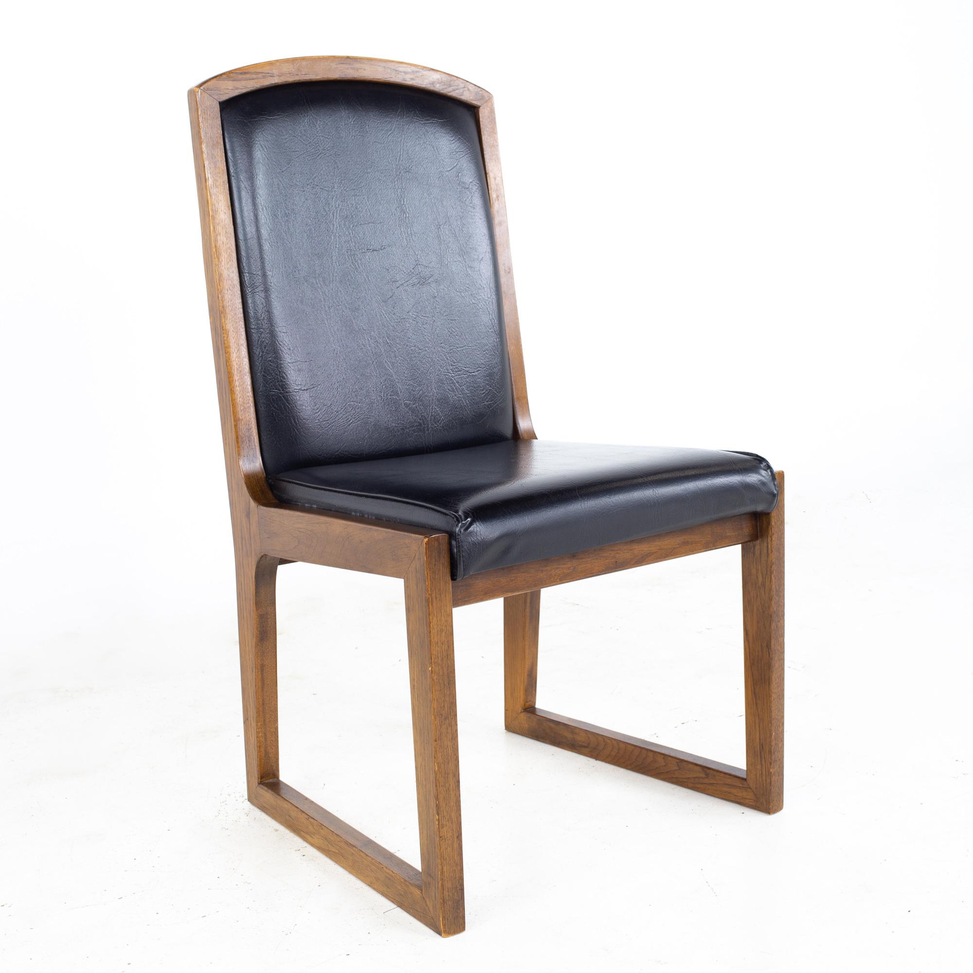 Thomasville Mid Century Walnut and Black Naugahyde Sleigh Leg Dining Chairs, Se For Sale 1