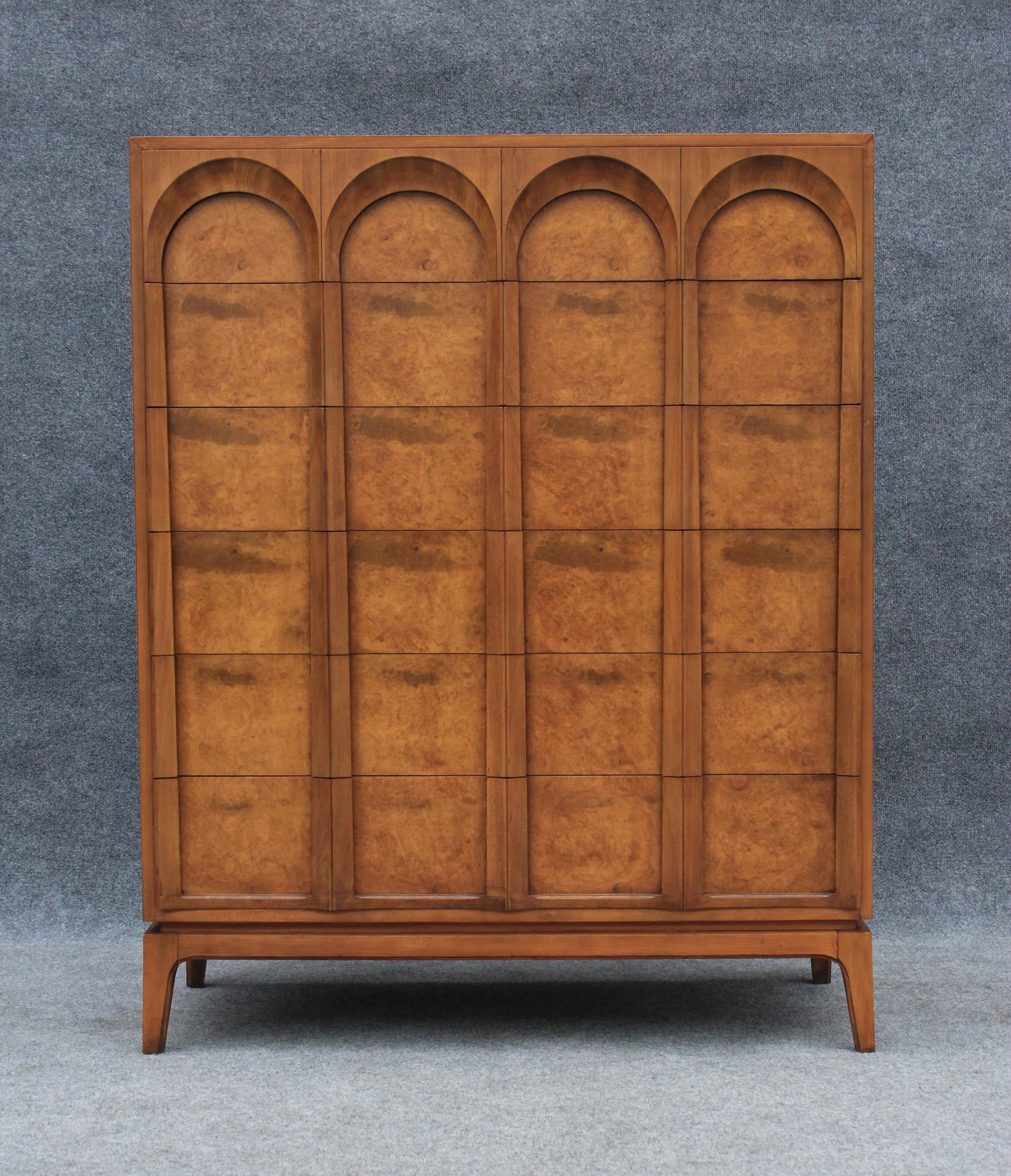 In the classic and timeless style of T.H. Robsjohn Gibbings, the 'Arched' series by Thomasville is made in the US, circa 1960s, and is of heirloom quality. The finest hardwoods of walnut and olive ash burl, create a sculptural rhythm that evokes