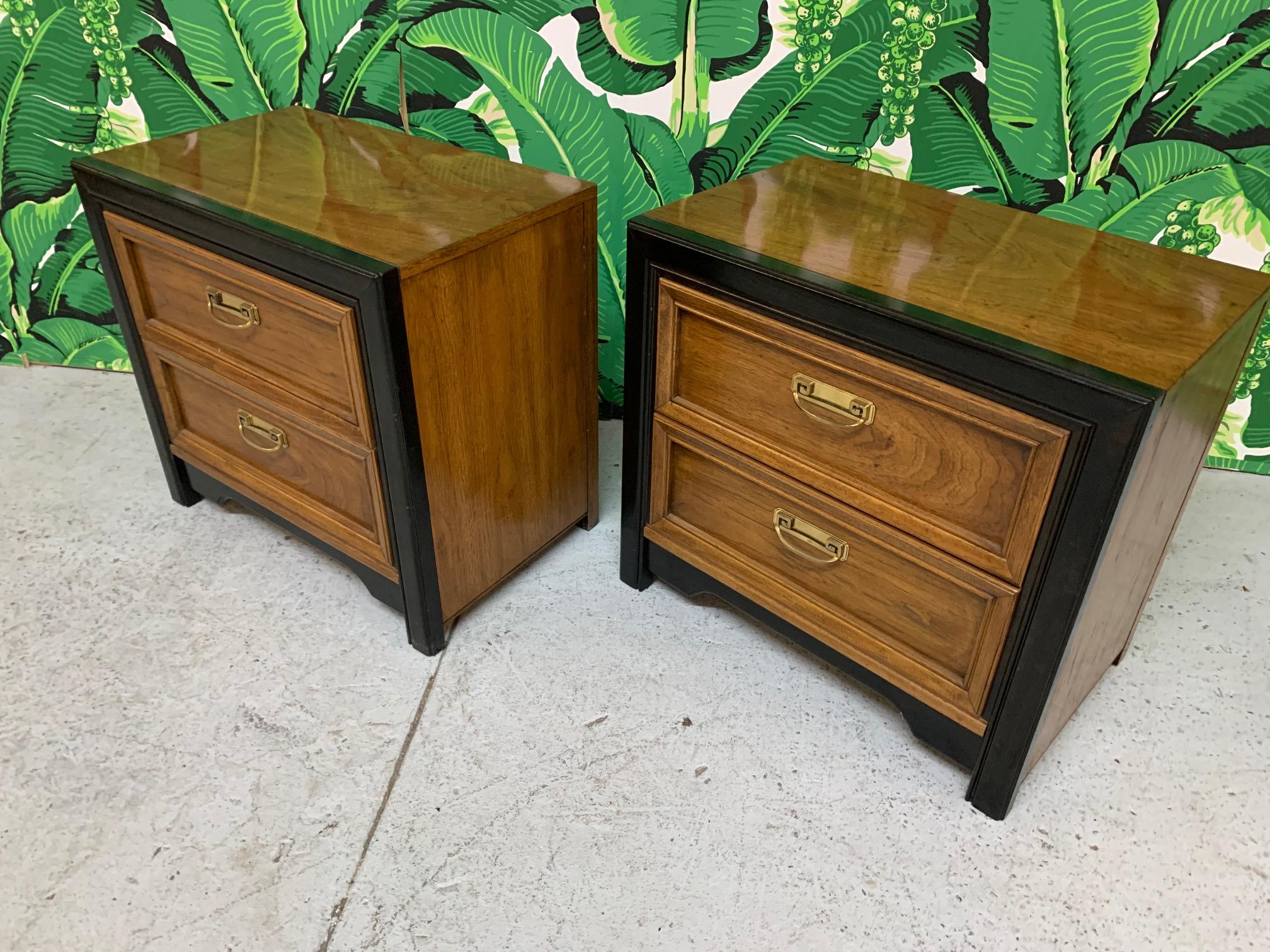 Vintage nightstands or bedside tables by Thomasville features two-tone finish and brass hardware. Very good condition with minor imperfections consistent with age.