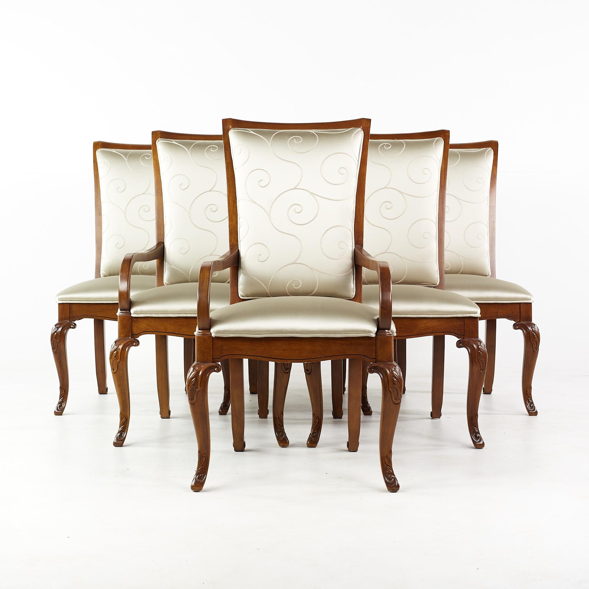 Thomasville walnut dining chairs - set of 6

Each armless chair measures: 23 wide x 27 deep x 42 high, with a seat height of 18 inches.
Each captains chair measures: 23 wide x 27 deep x 42 high, with a seat height of 18 inches, the arm
