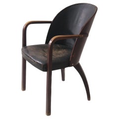 Thonet armchair with original period leather, label.