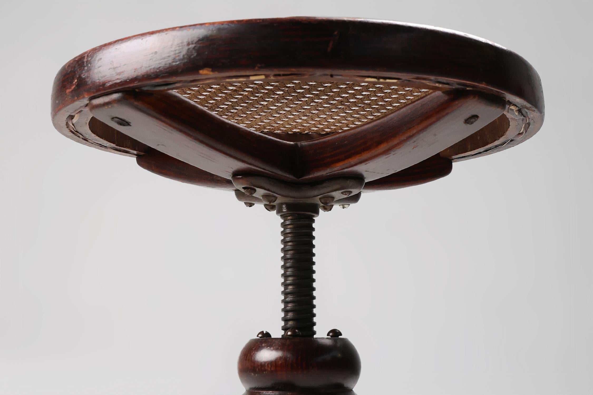 Rattan Thonet beech bentwood piano stool with caned seat, Austria ca. 1900 For Sale