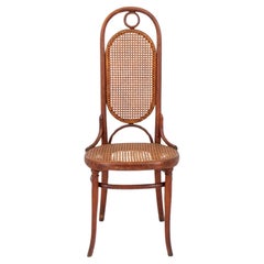 Chaise d'appoint Thonet n° 207r en bois cintré et canné