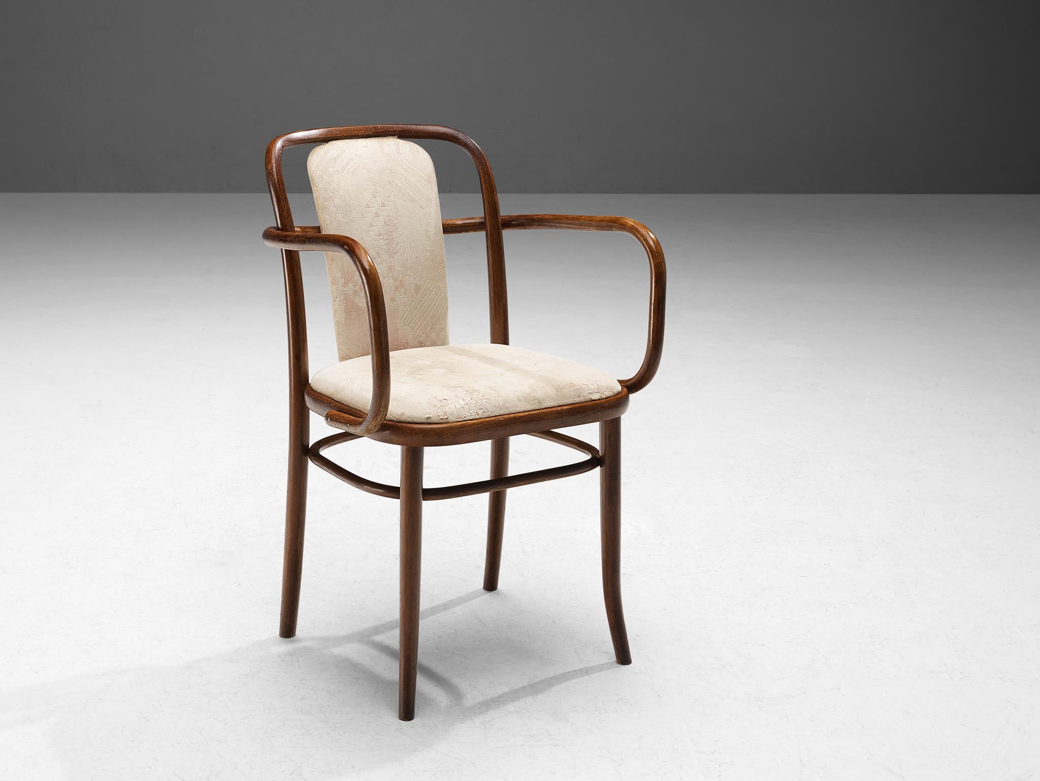 TON, armchair, bentwood, fabric, Czech Republic, 1930s.

Elegant dining chair made in bentwood. The lines and shapes are dynamic but in a soft sense, the light color of the backrest and seating area also add to this serene appearance. This