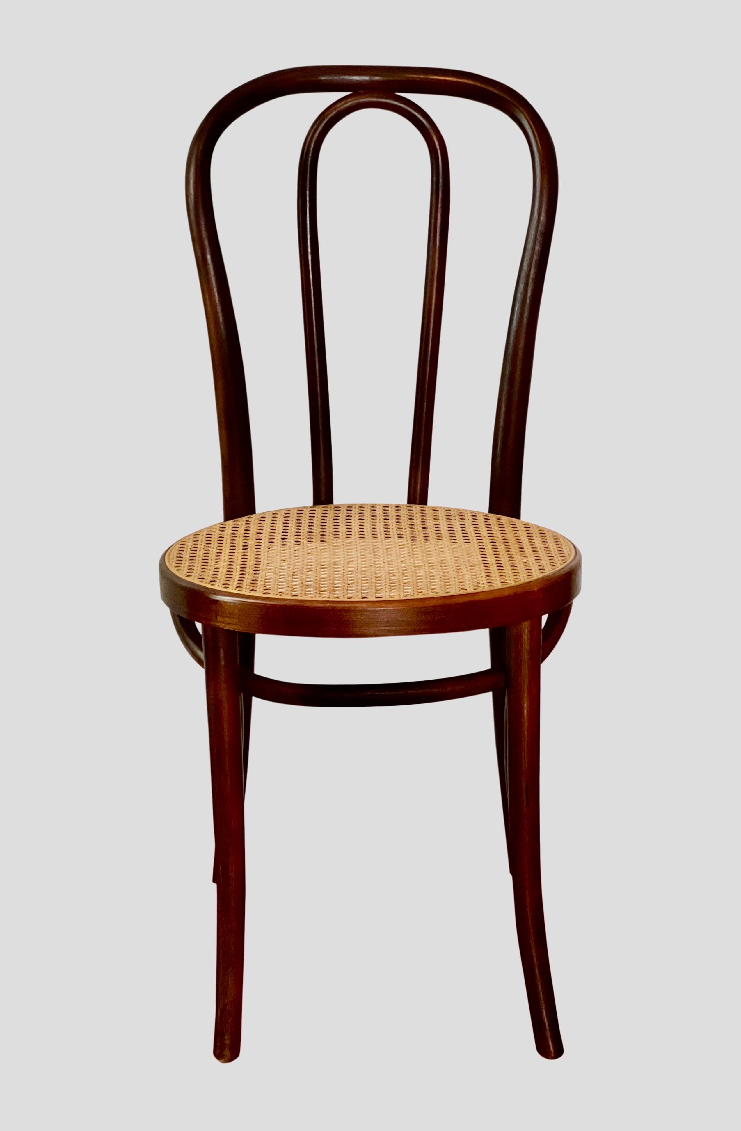 Thonet bentwood cane cafe or side chair, 1920's

This iconic design chair has a sturdy yet lightweight beechwood frame. An original classic great for a variety of settings. It is stamped on the bottom. Both the cane and bentwood frame are in very