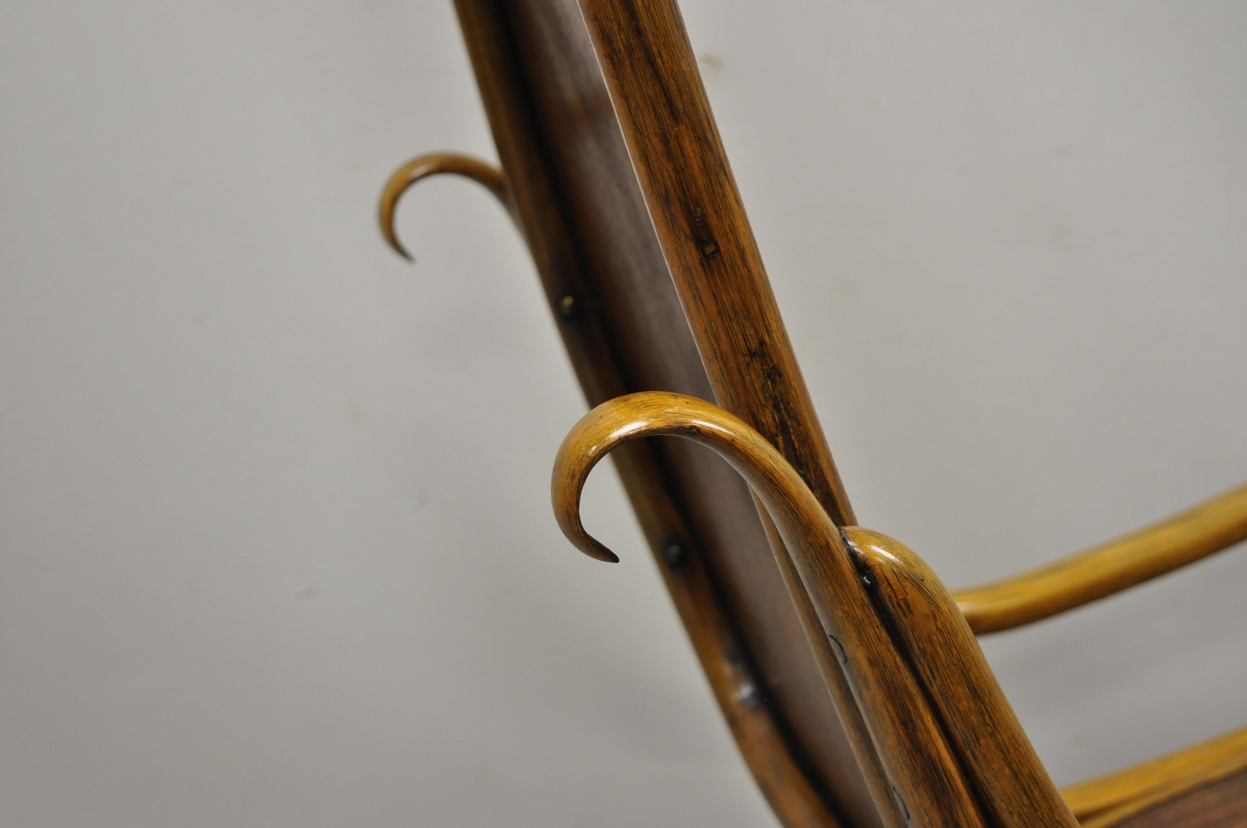 Austrian Thonet Bentwood Rocking Chair Figural Pressed Wood Griffins and Northwind Face