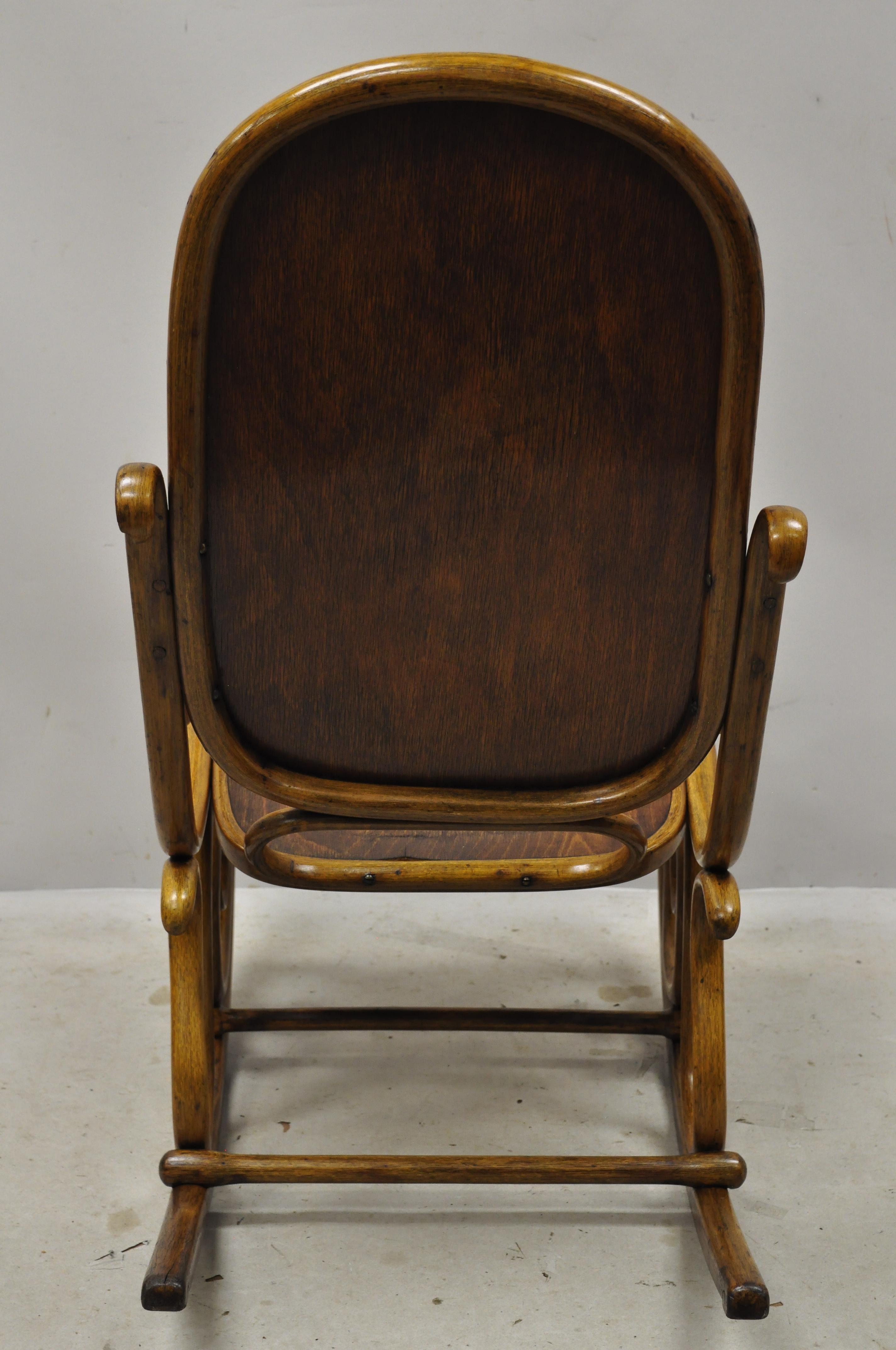 19th Century Thonet Bentwood Rocking Chair Figural Pressed Wood Griffins and Northwind Face