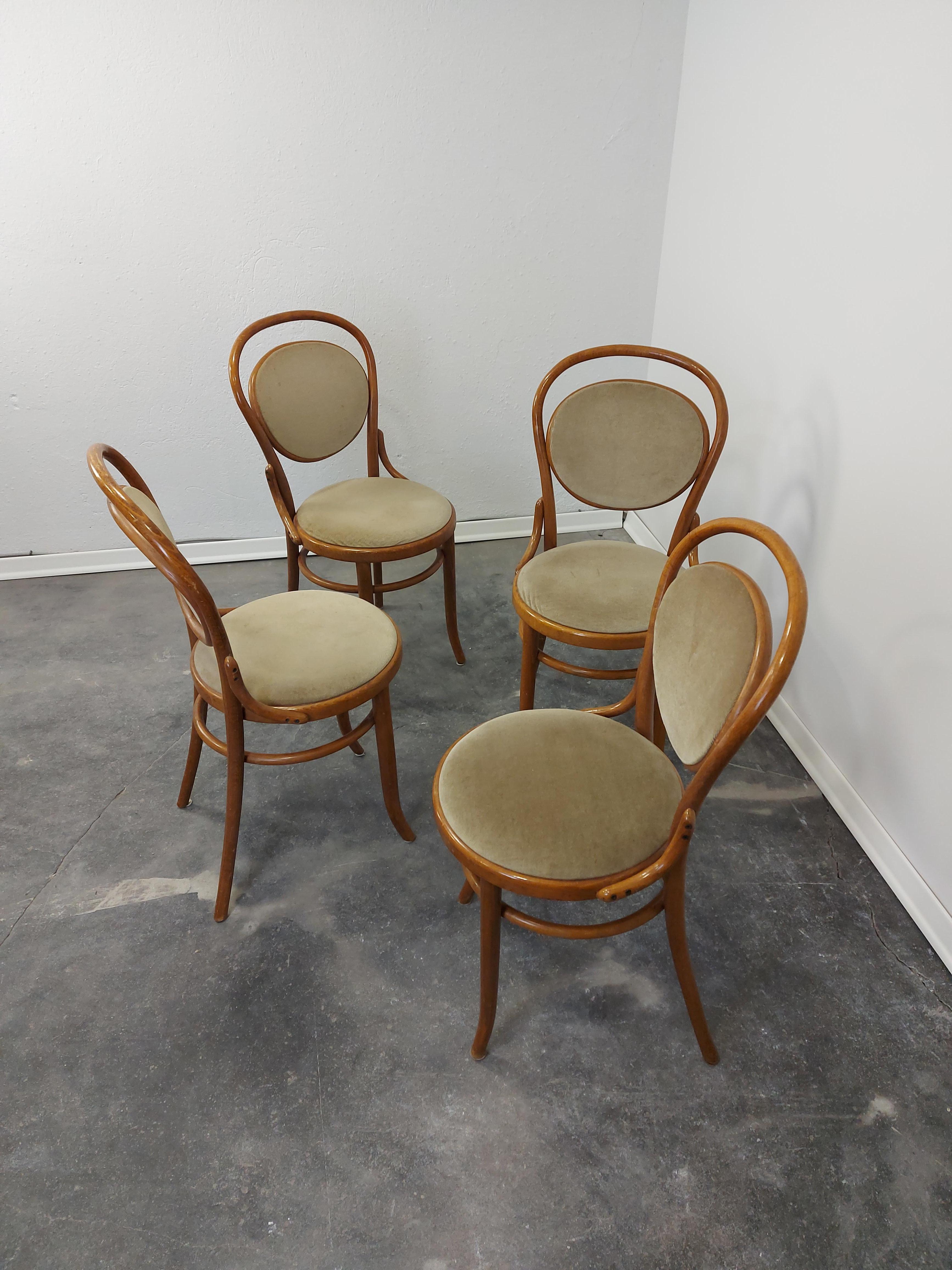 1 of 4 Thonet No. 215 chairs was manufactured 1970.
The chair was designed by Michael Thonet in 1859. 
It features a beech bentwood frame and a fabric seat. 
Clear wood finish. Wood and fabric are in good condition. 
Price is for one chair.