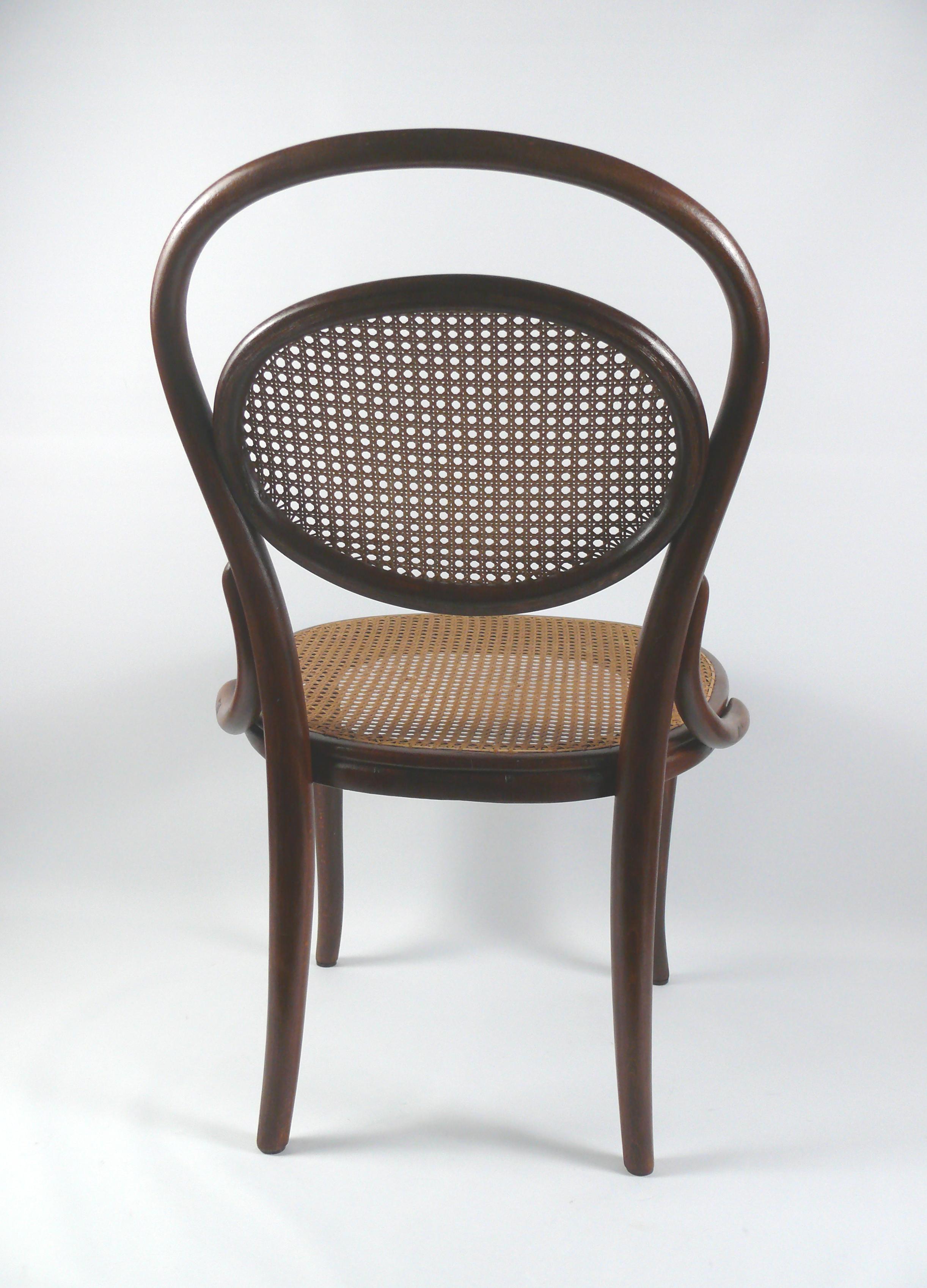 High-quality collector's item: Antique bentwood children chair Nr. 1 from the late 19th century. 
The chair is made of beech wood, screwed together and this chair has the optional reinforcements between the backrest and seat, which you could always
