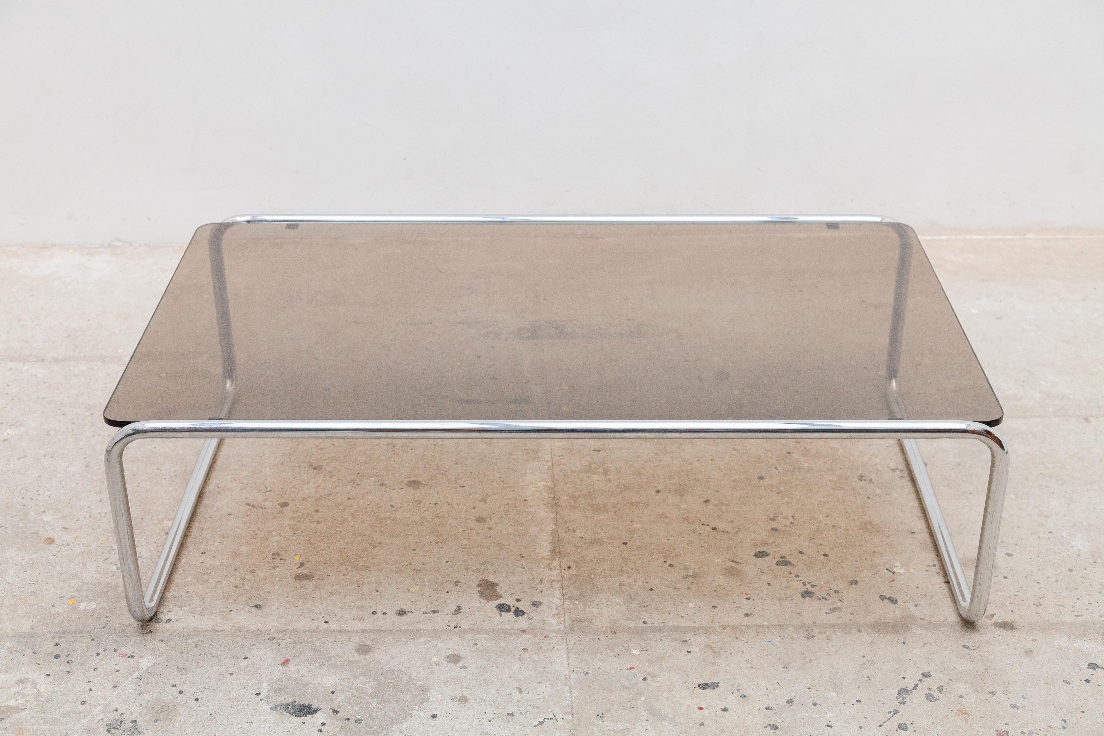 Elegant tubular chrome coffee table with original smoked glass top in Bauhaus style, 1970s.