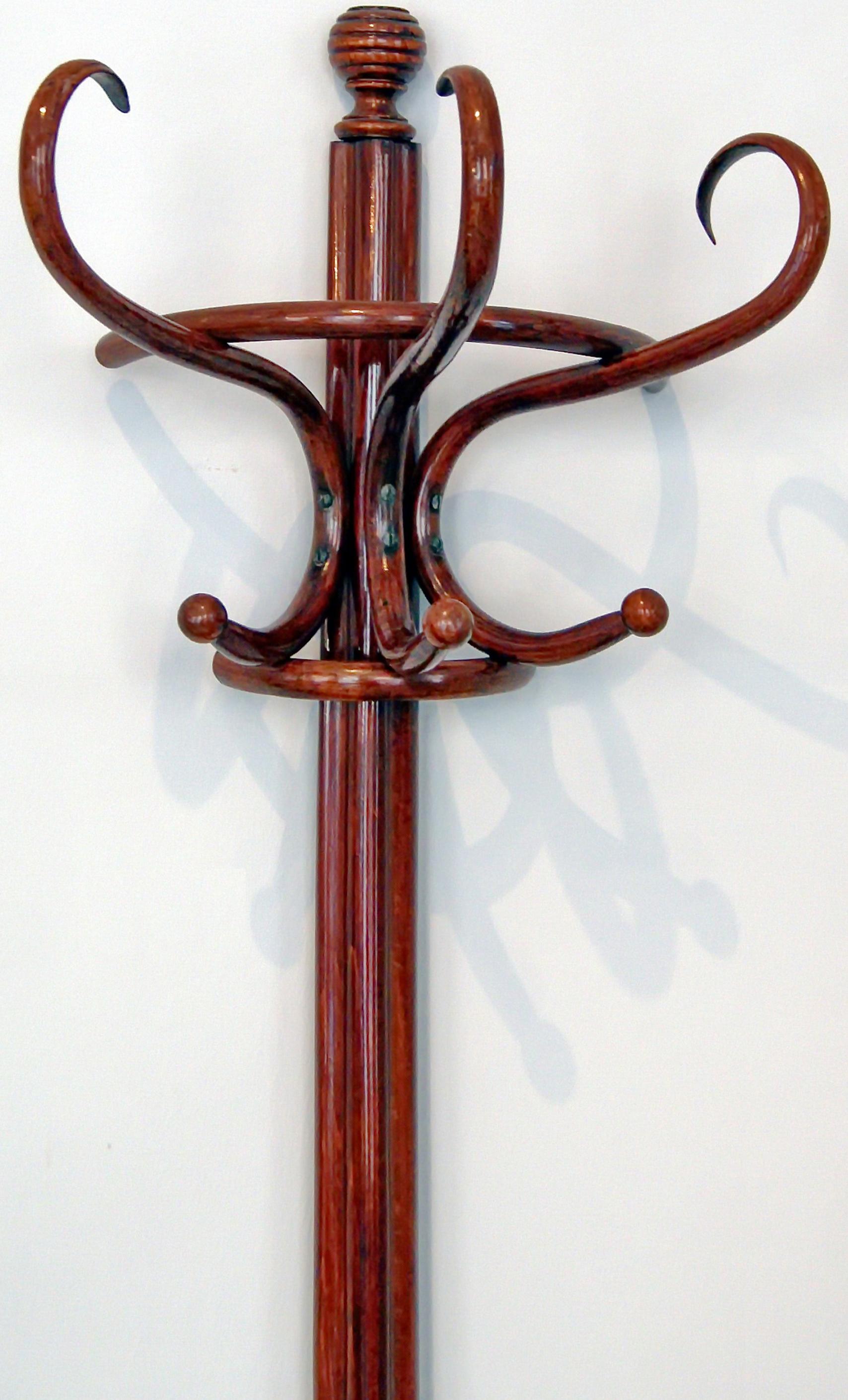 THONET COAT-TREE / COAT RACK FOR PLACEMENT AT WALL, MODEL NUMBER  10601  
(authenticity guaranteed !)

beech wood  /  bright mahogany stained  /  refurbished by hand  /  the wood is amazingly bent in most finest Thonet manner !  This Thonet coat