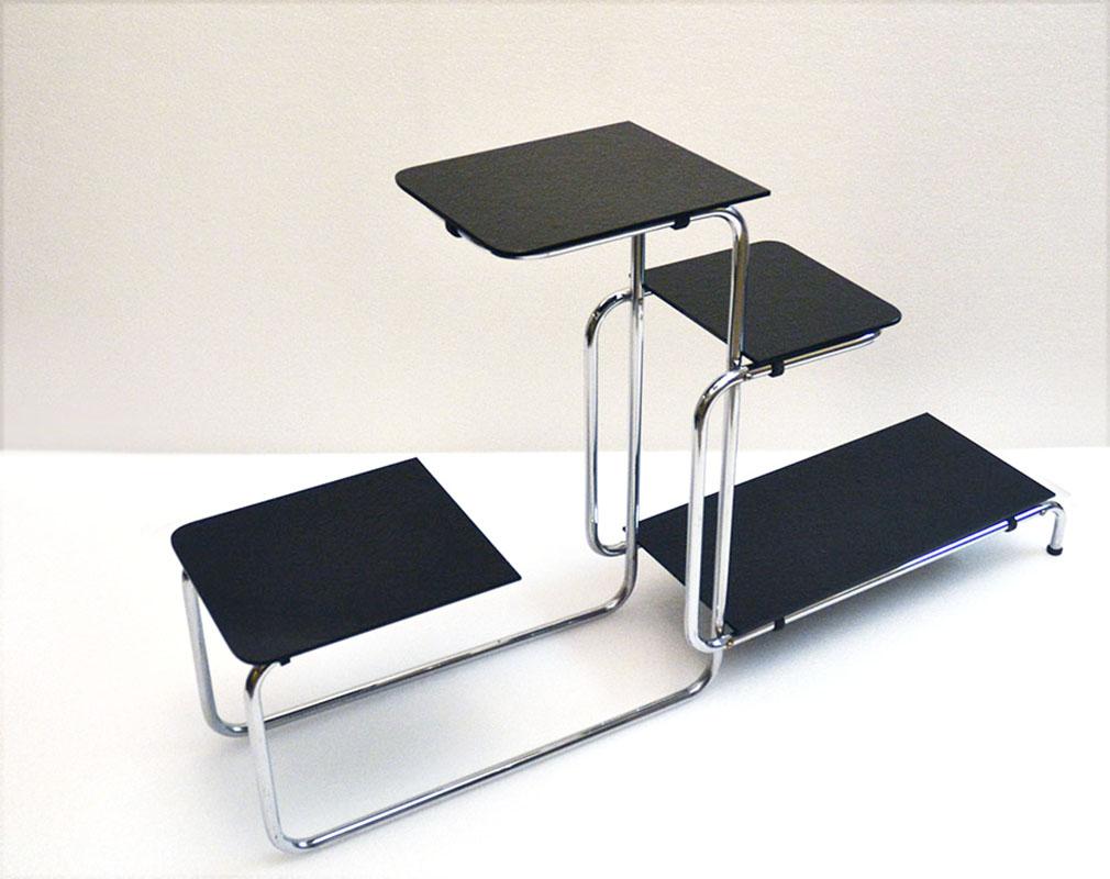 Thonet console table design Emile Guyot 1940s.
Chromed tubular frame with rubber top holders, four original black glass tops with knurled underside to prevent glass from slipping.
In excellent condition.