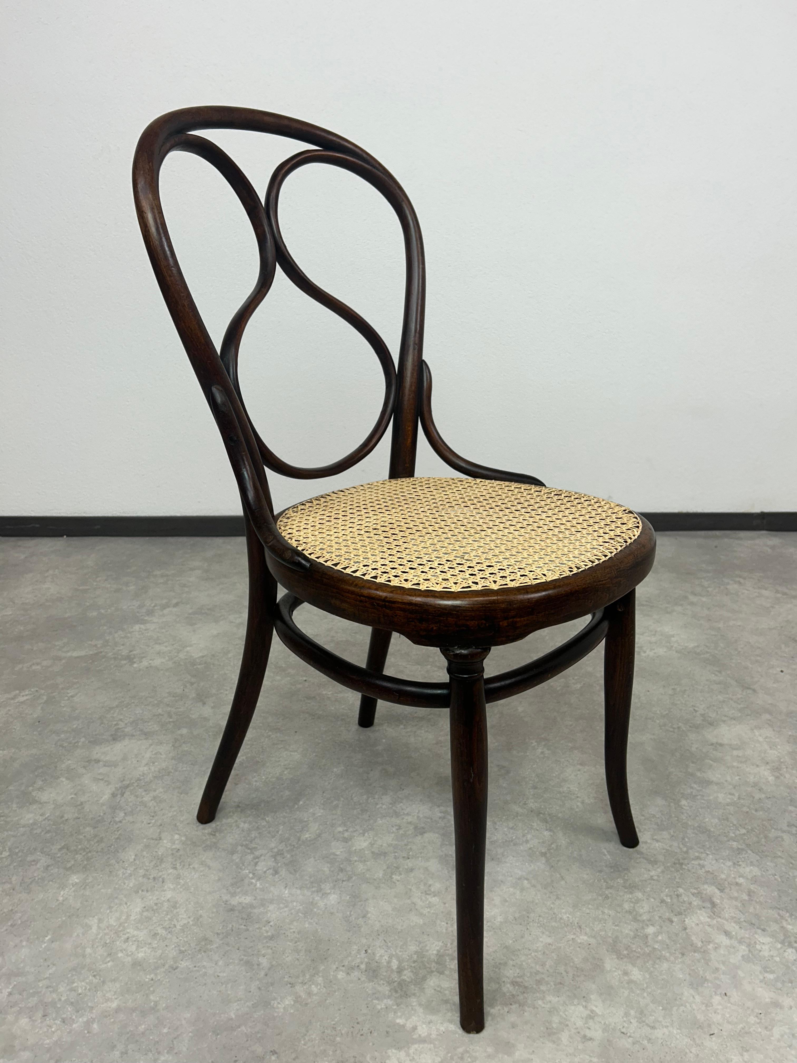 Thonet dining char no.1. Professionally stained and repolished with new handmade rattan seat.